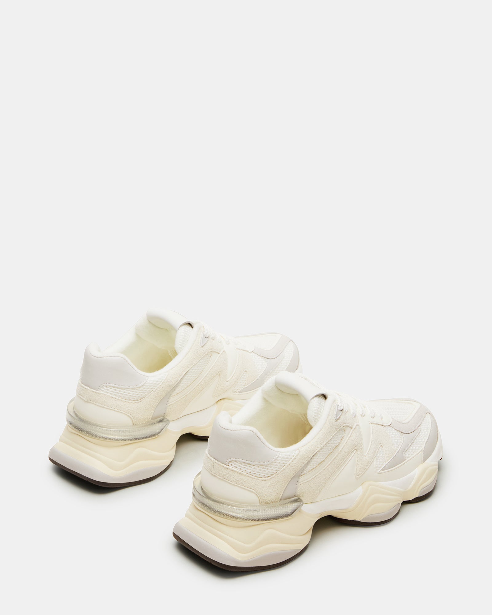 Low-top sneakers worn with casual jeans for style inspiration