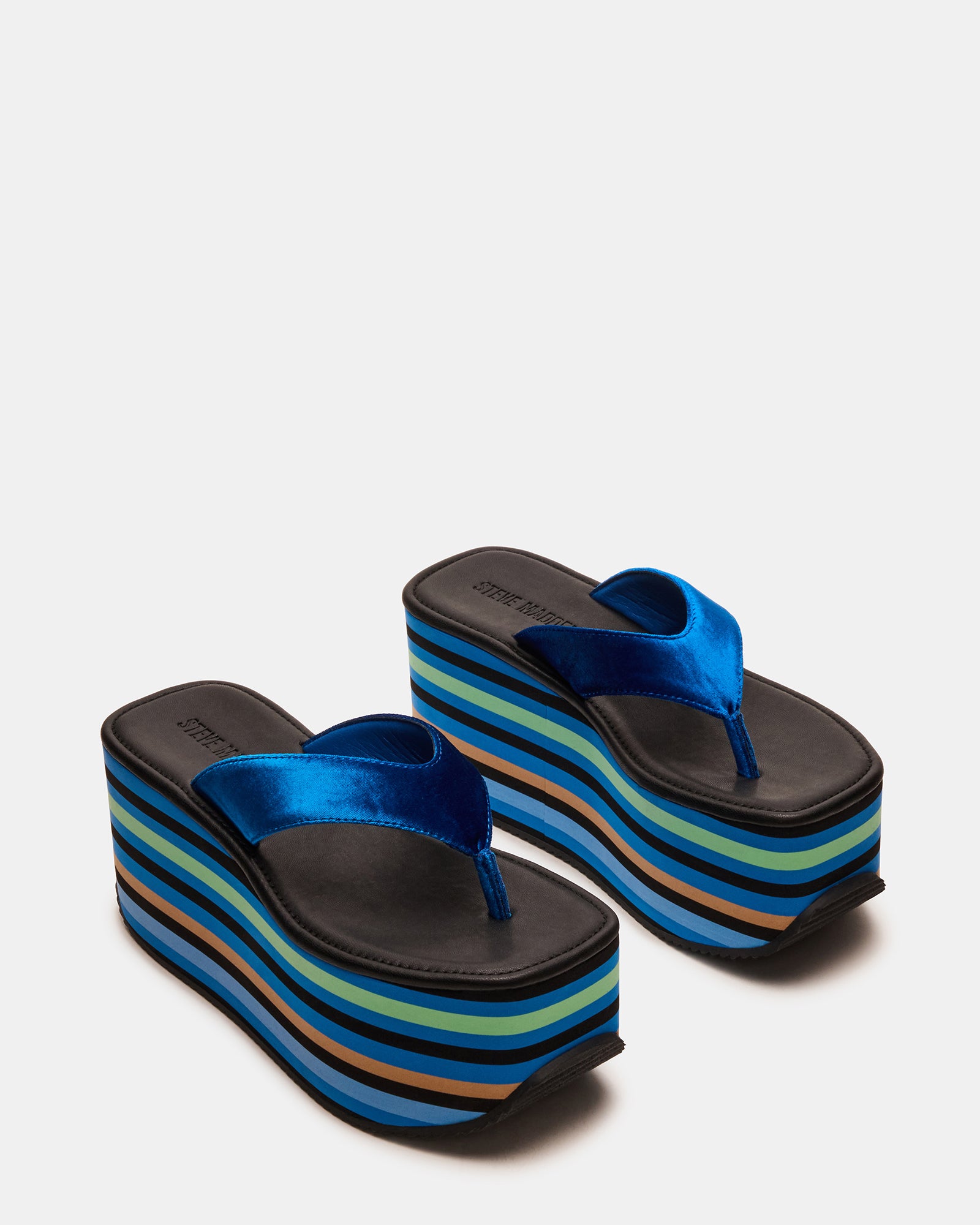 Side view of ladies flatform sandals, highlighting the 3.5-inch heel and square-toe design.