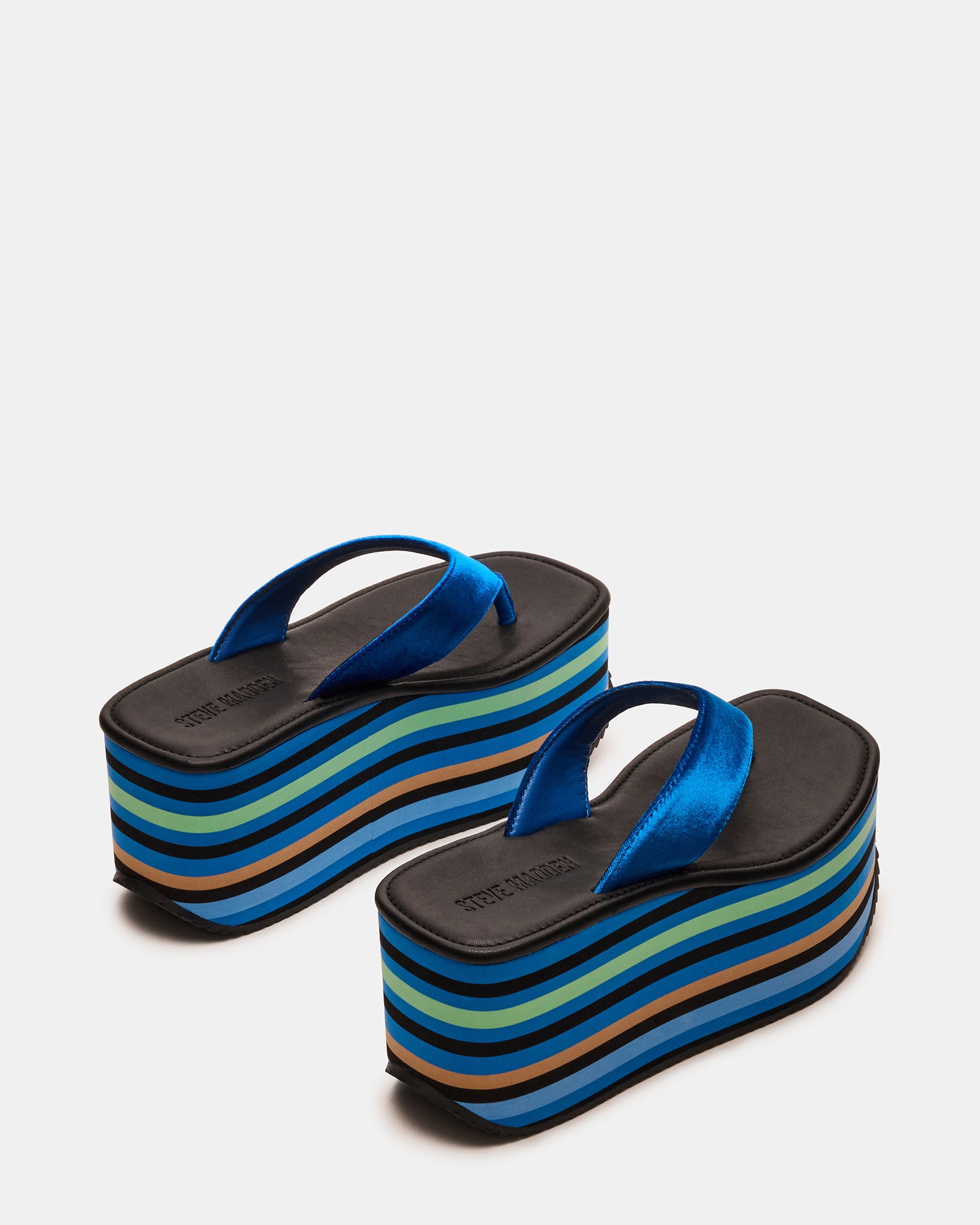 Side view of ladies flatform sandals, highlighting the 3.5-inch heel and square-toe design.
