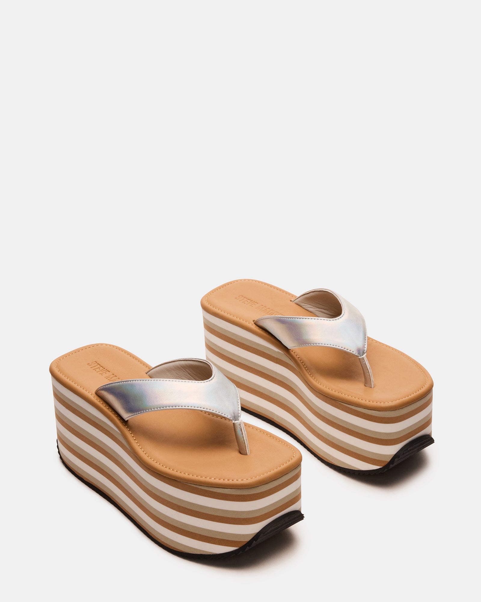 Multi-color ladies flatform sandals ideal for casual summer outfits.