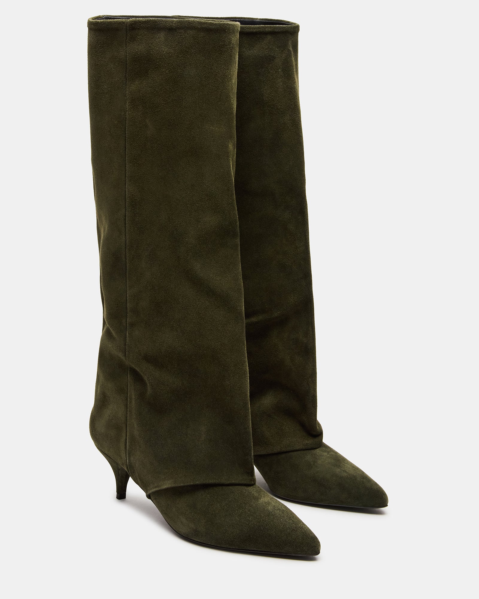 Fashionable womens suede boots with pointed toe, worn with denim