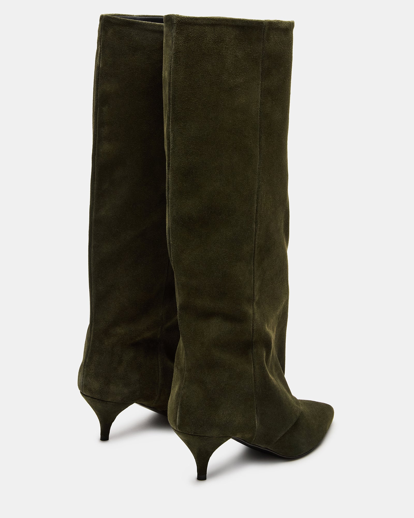 Fashionable womens suede boots with pointed toe, worn with denim