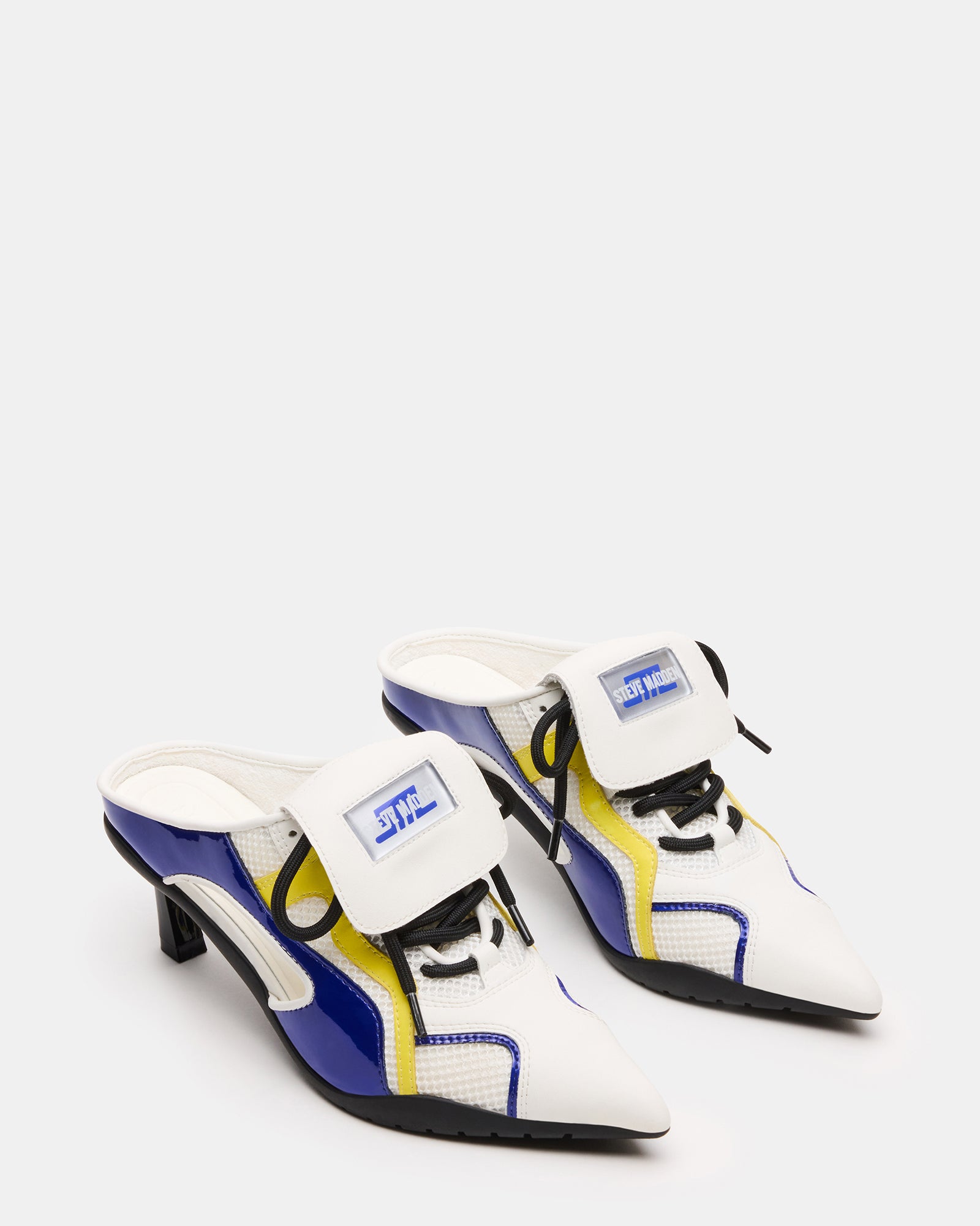 Close-up of the pointed toe and stylish lace-up details on SHEVRON sneakers with heels