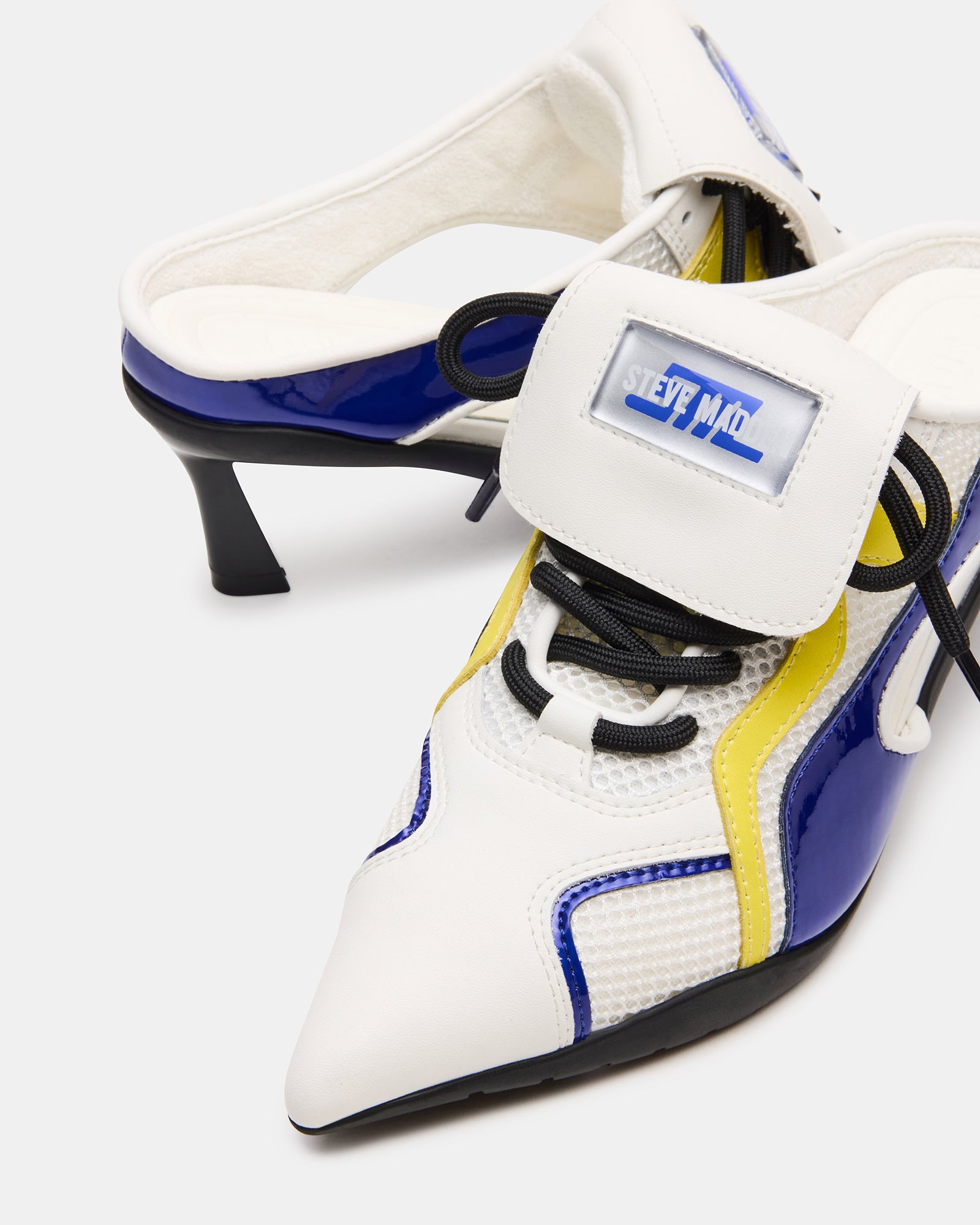 Fashionable SHEVRON slip-on sneakers on high heels styled with casual outfits