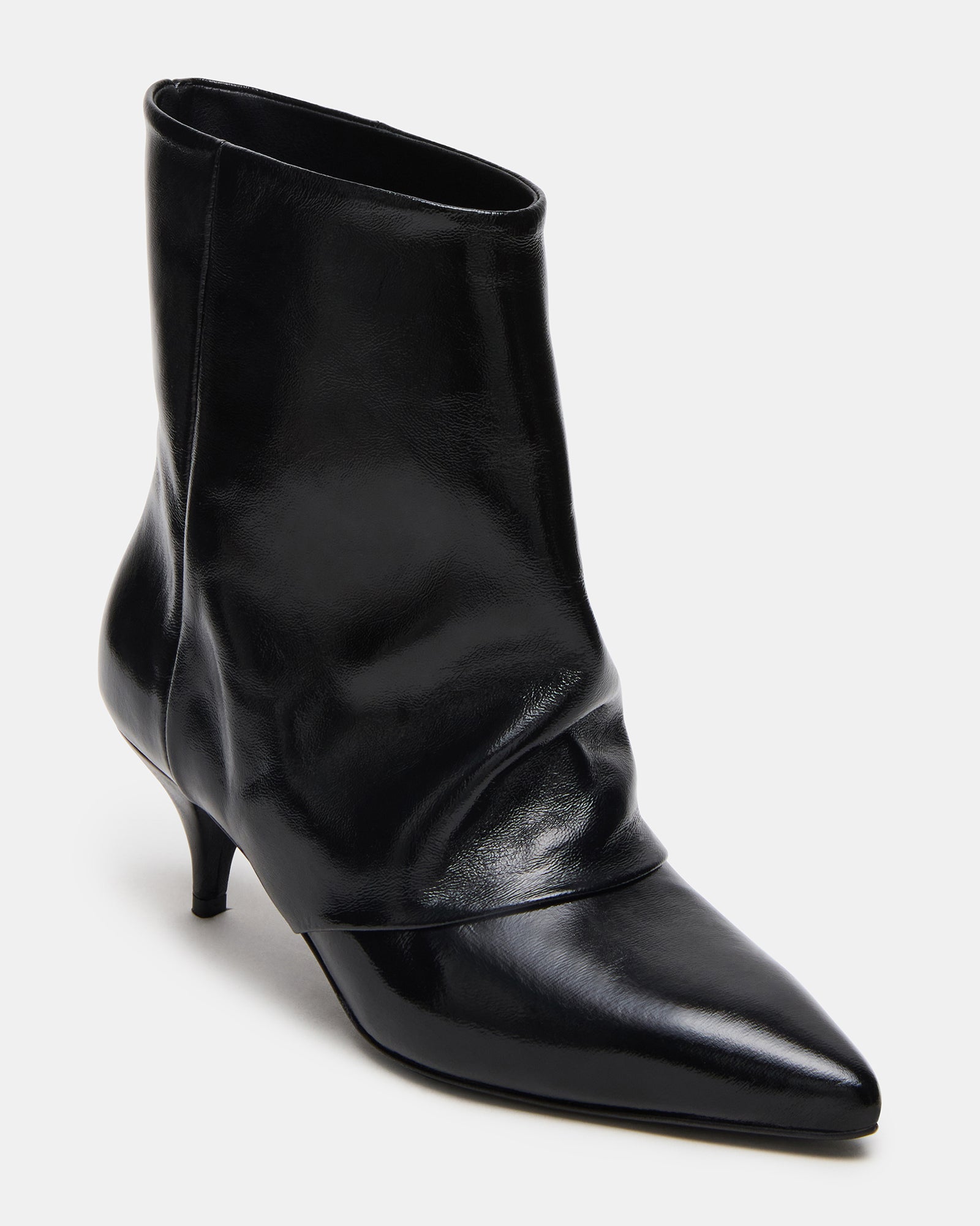 Close-up of brown leather boots detailing stitching and material quality