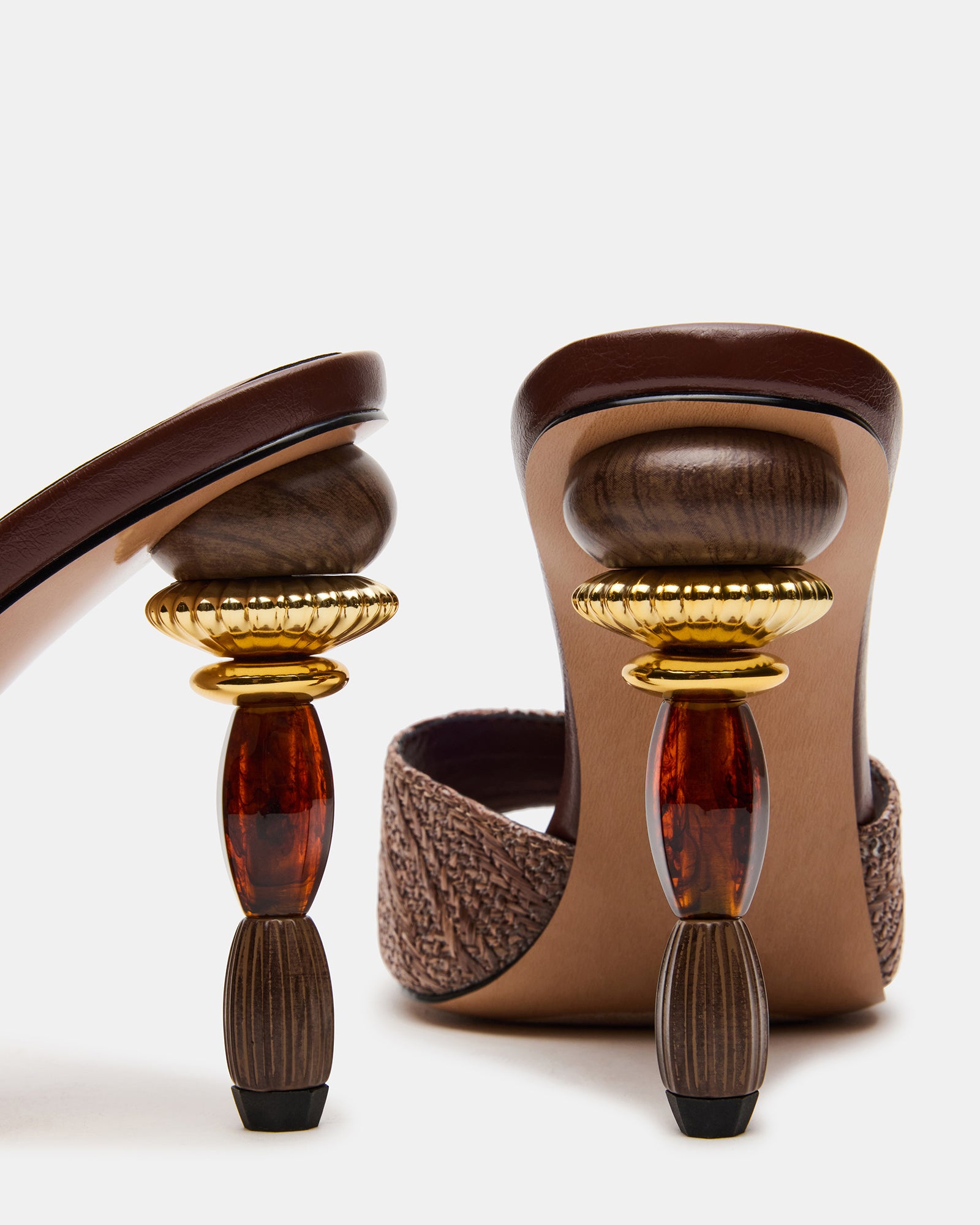 Square toe mary jane shoes paired with a summer dress on a café patio.