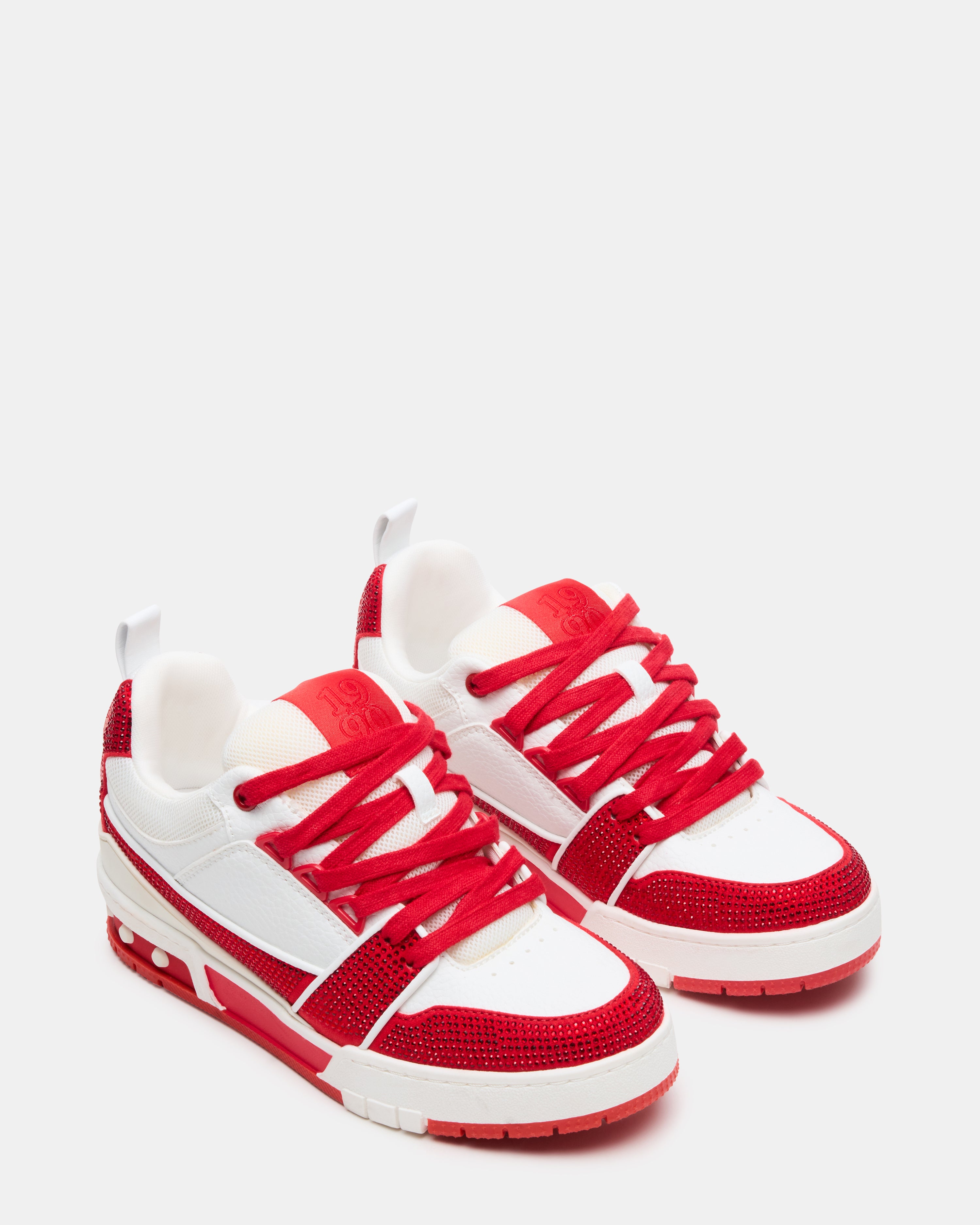 Side view of womens skater sneakers with rhinestones and lace-up closure