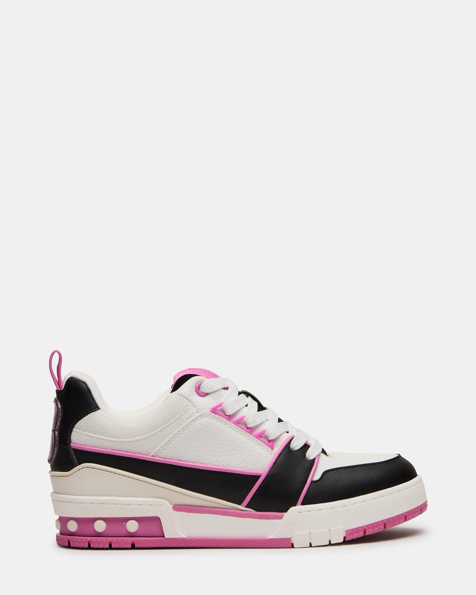 SKATER low-top sneakers on feet, showcasing the black and pink design