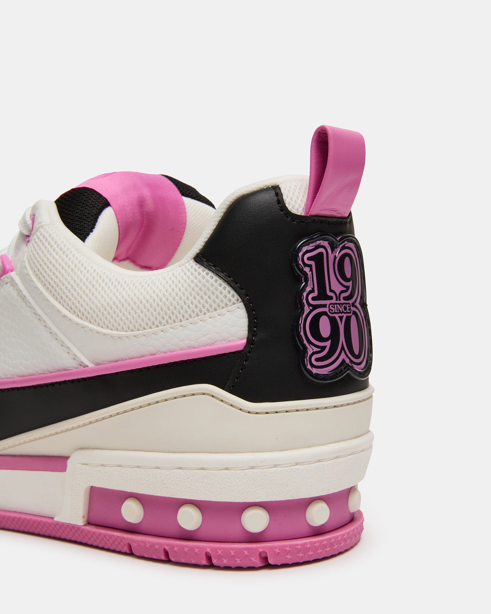 Close-up of the lace-up closure and textured upper material