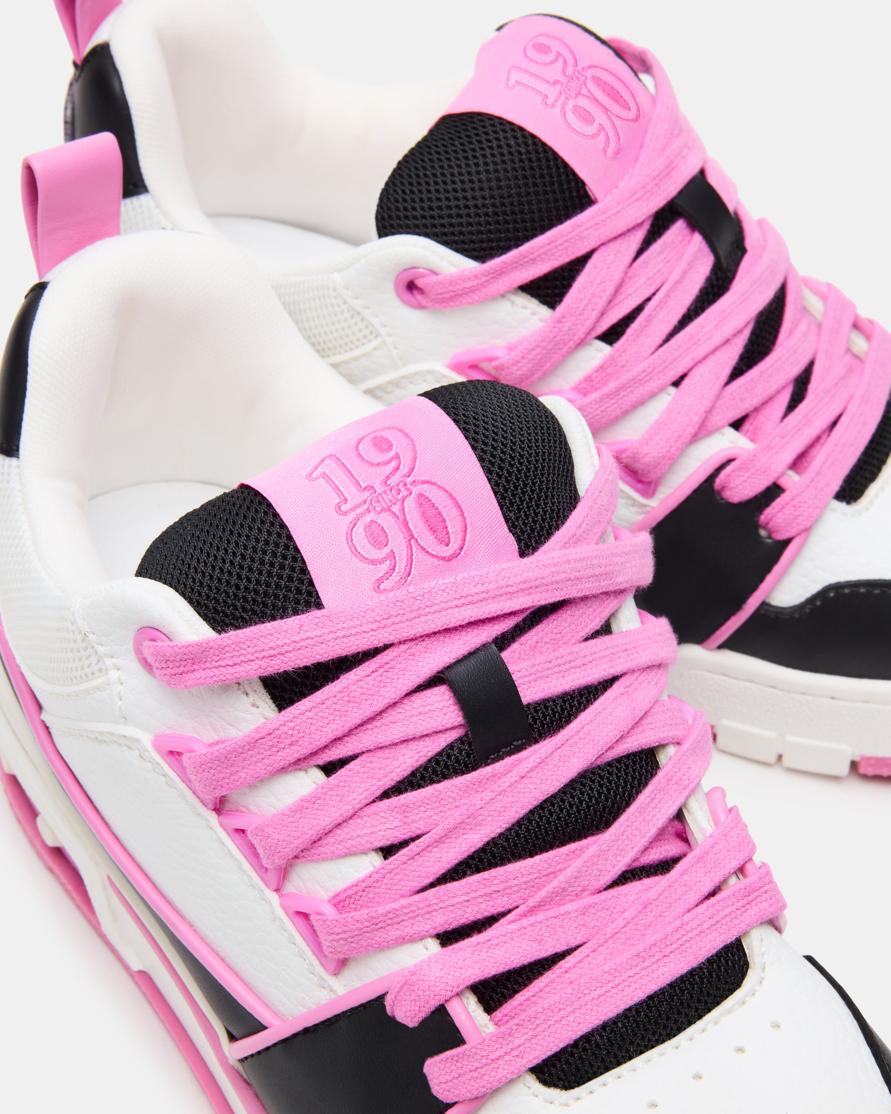 Side view of the sneakers highlighting the skate-inspired silhouette