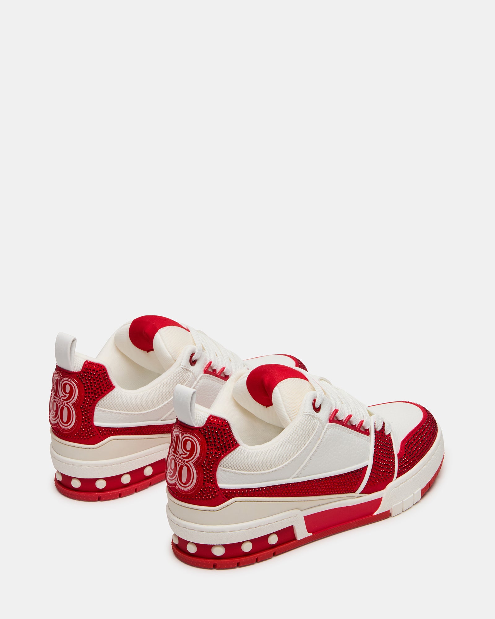 Front view of womens lace-up skate sneakers with white laces
