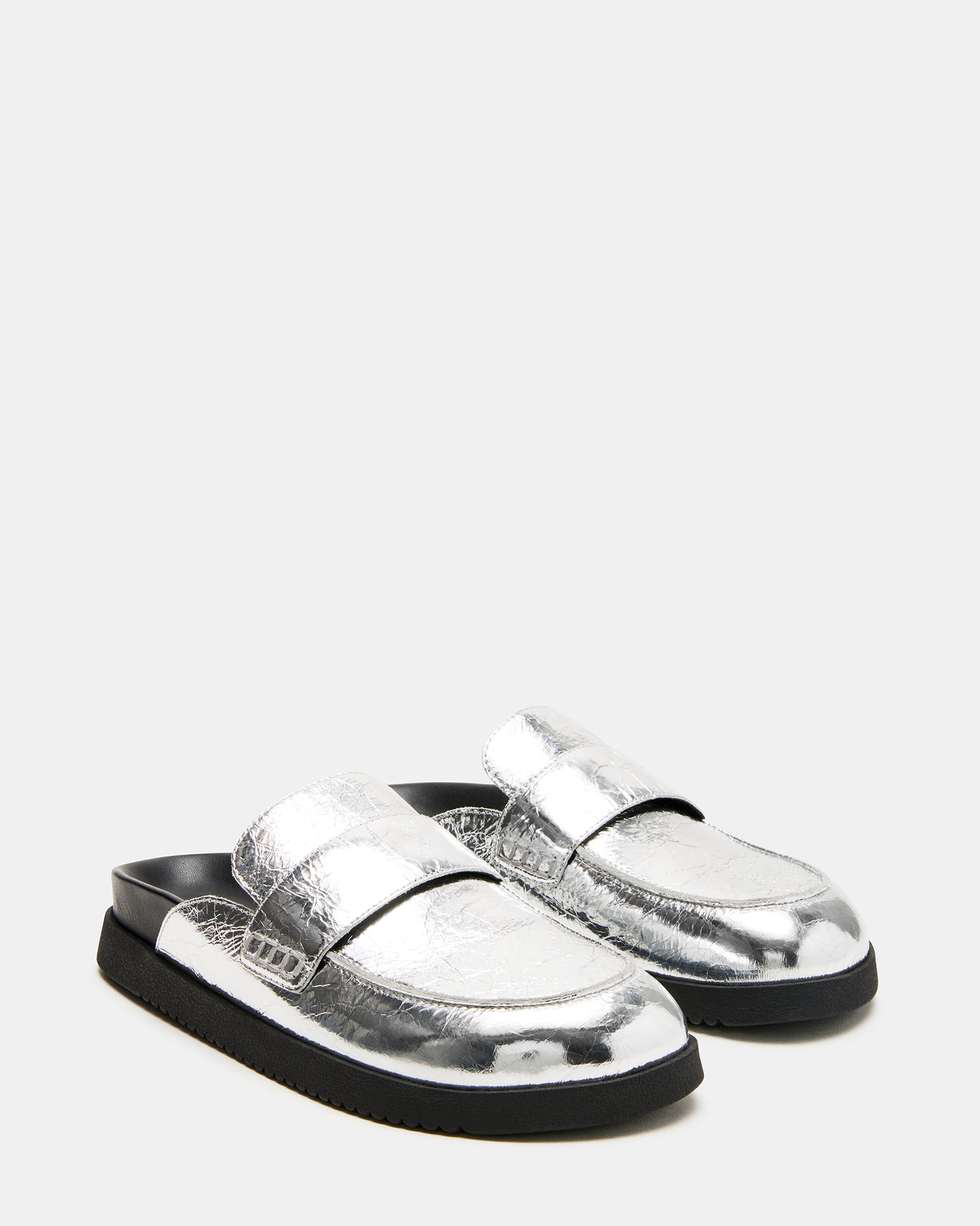 Comfortable Skipper mules worn casually on a sunny day.