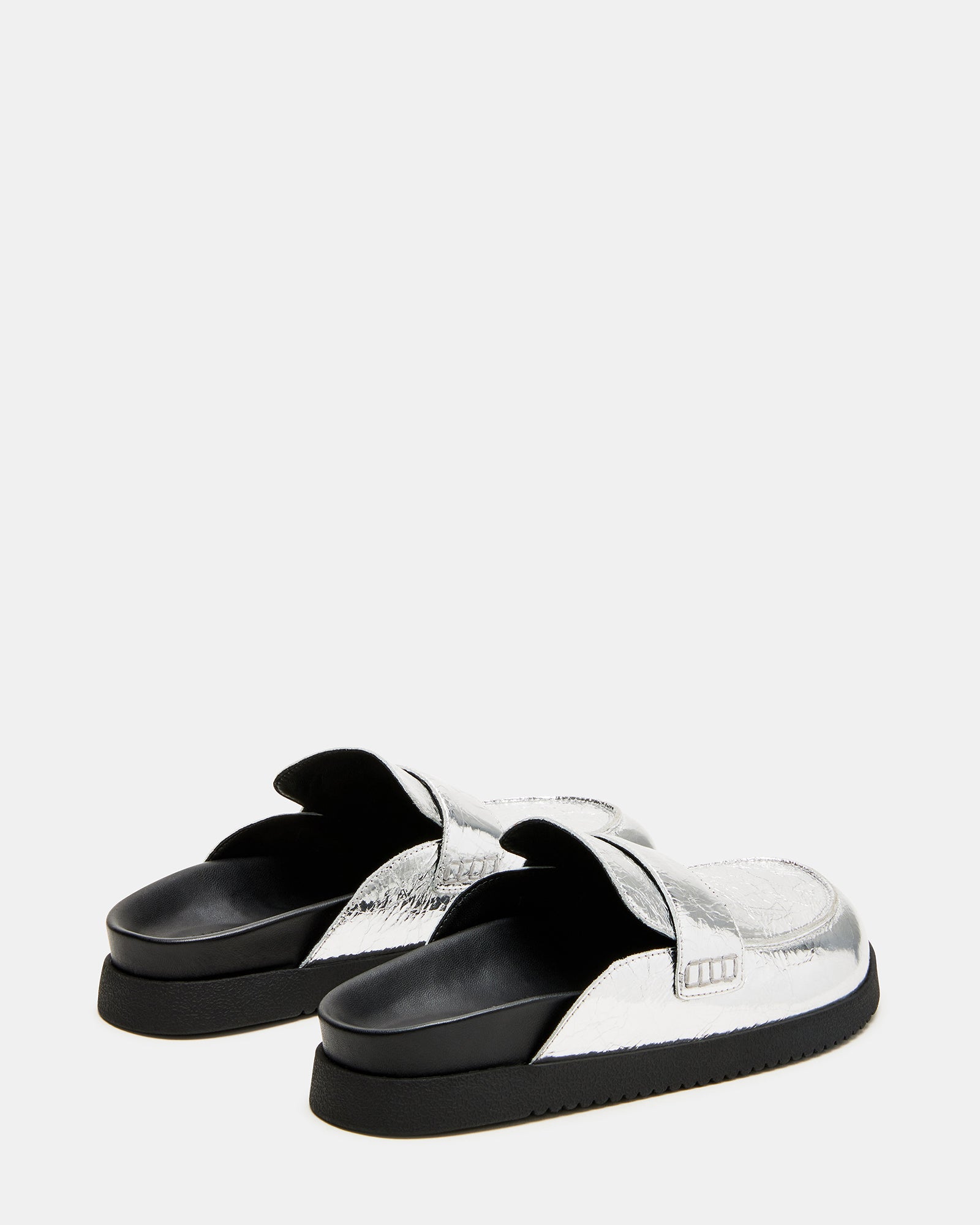Comfortable Skipper mules worn casually on a sunny day.