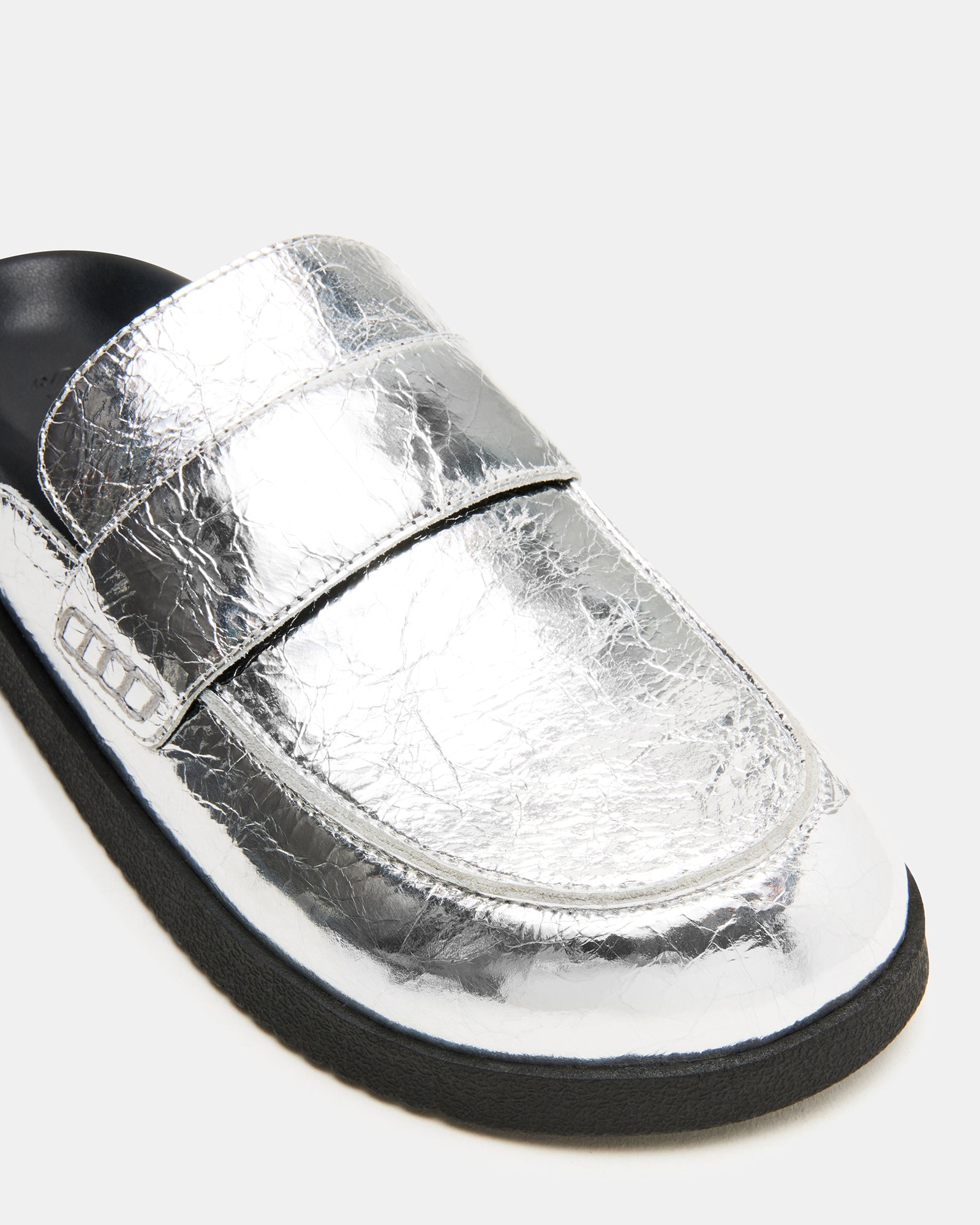 Close-up of the suede upper of Skipper slip-on shoes.