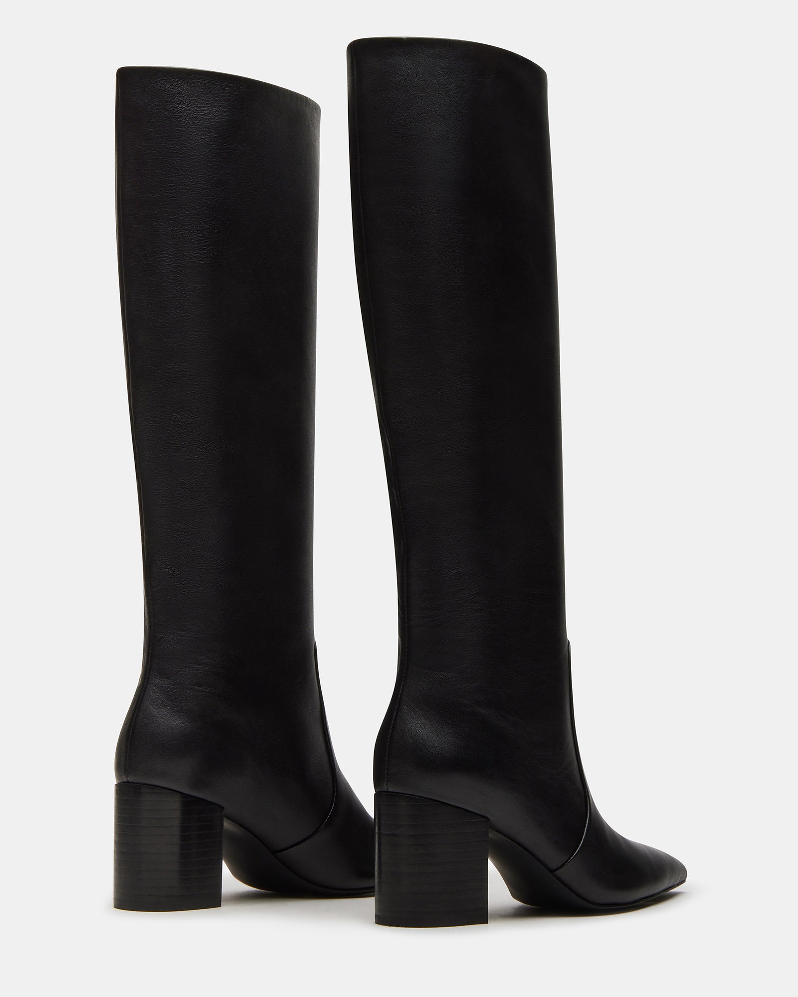 Fashionable black leather knee-high boots with a slim fit for stylish outings