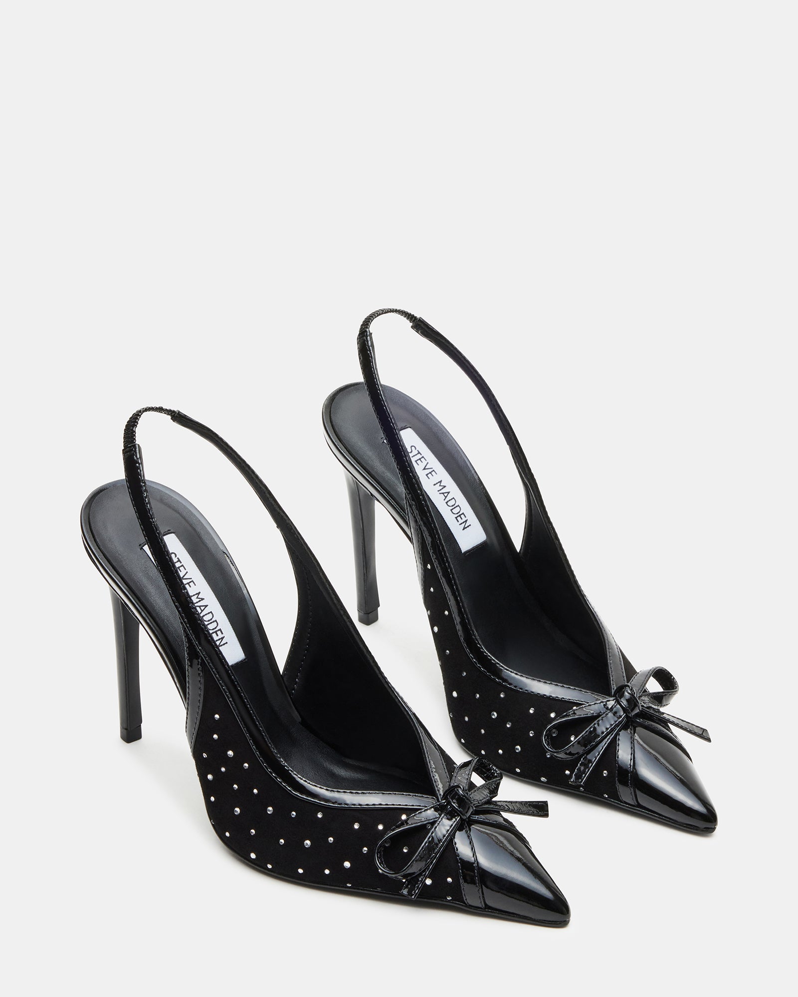 Close-up of platform stiletto heels highlighting suede texture