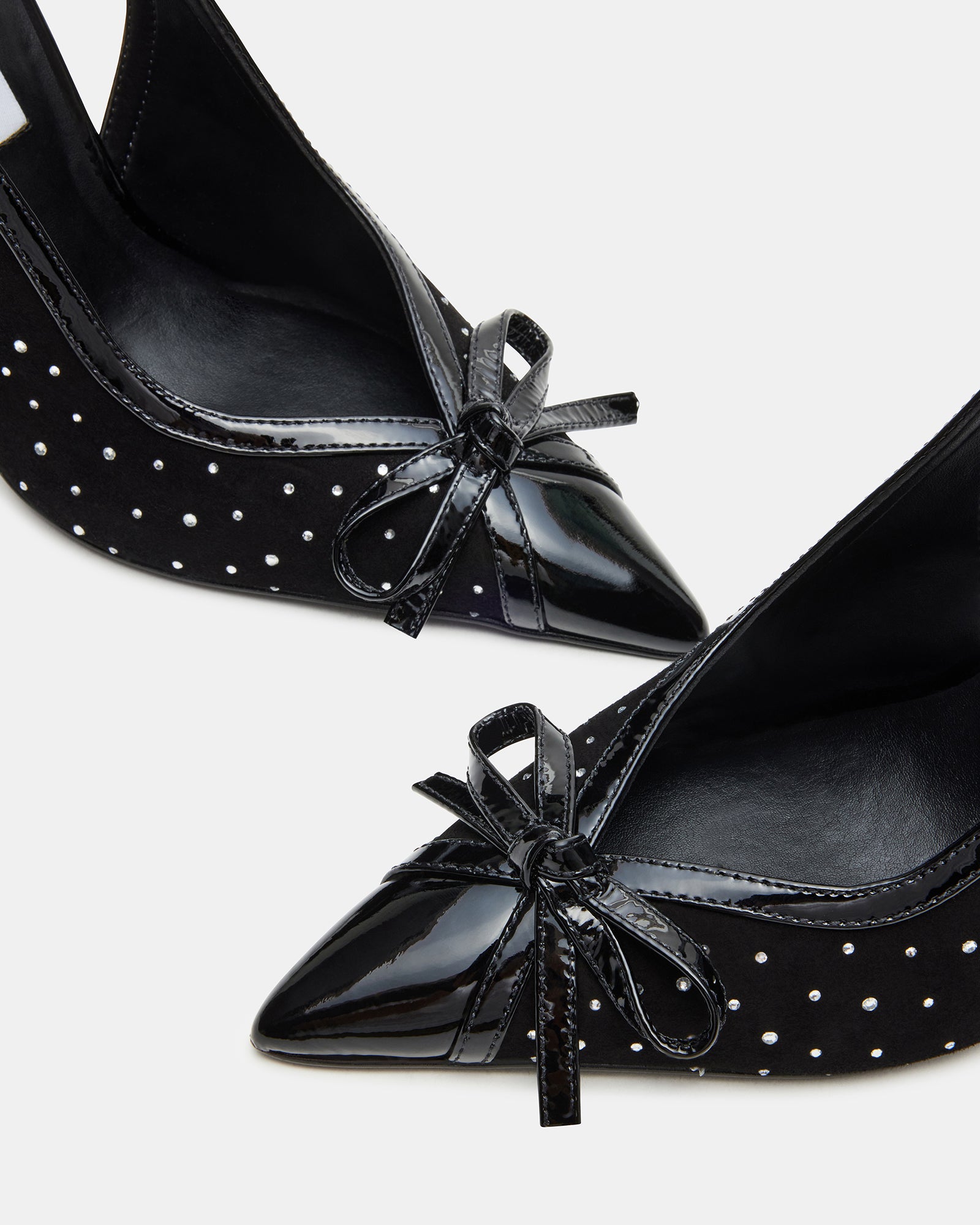 Pair of womens shoes styled for upscale NYC evening wear
