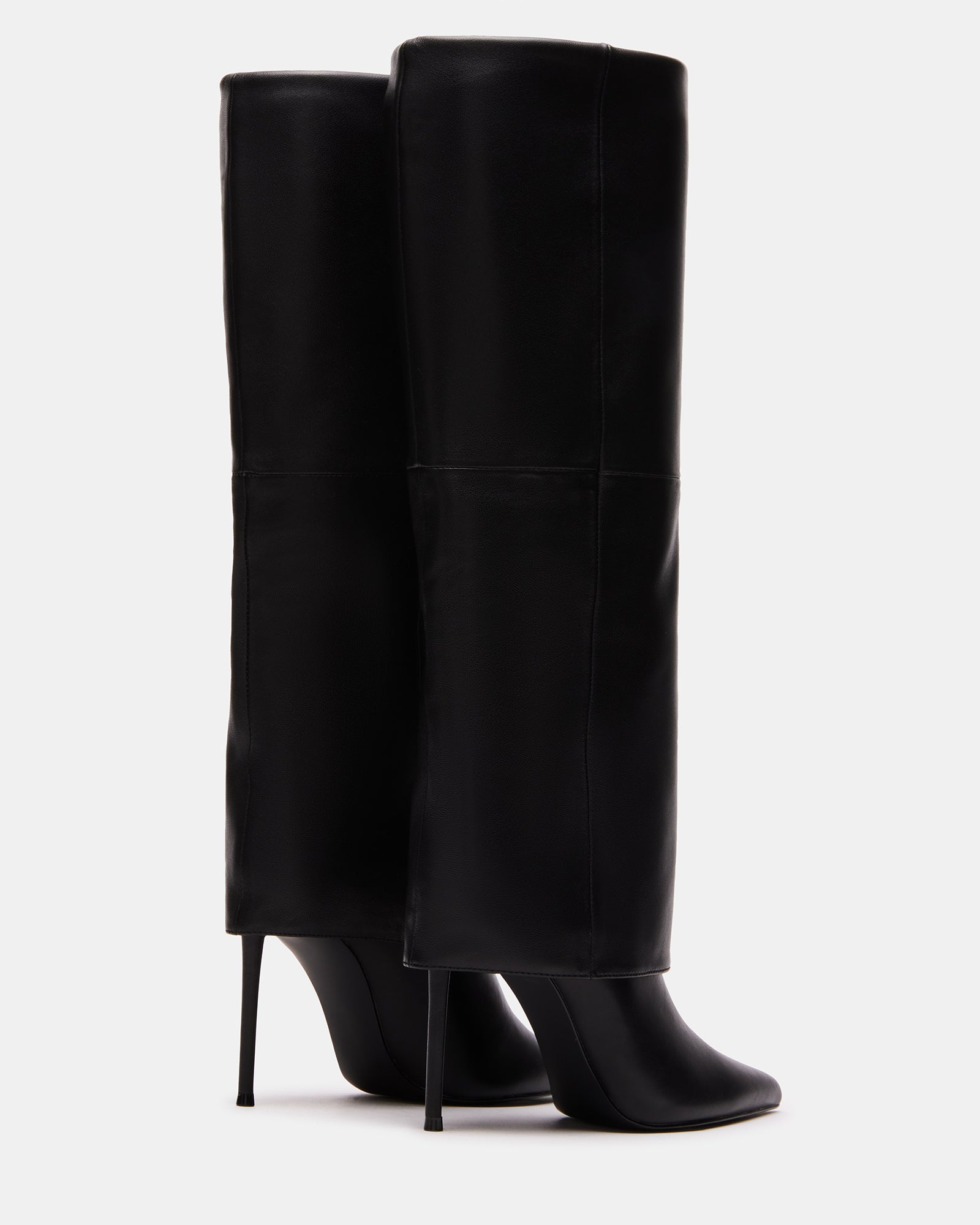 Side angle showing pointed toe and fold-over knee boot profile
