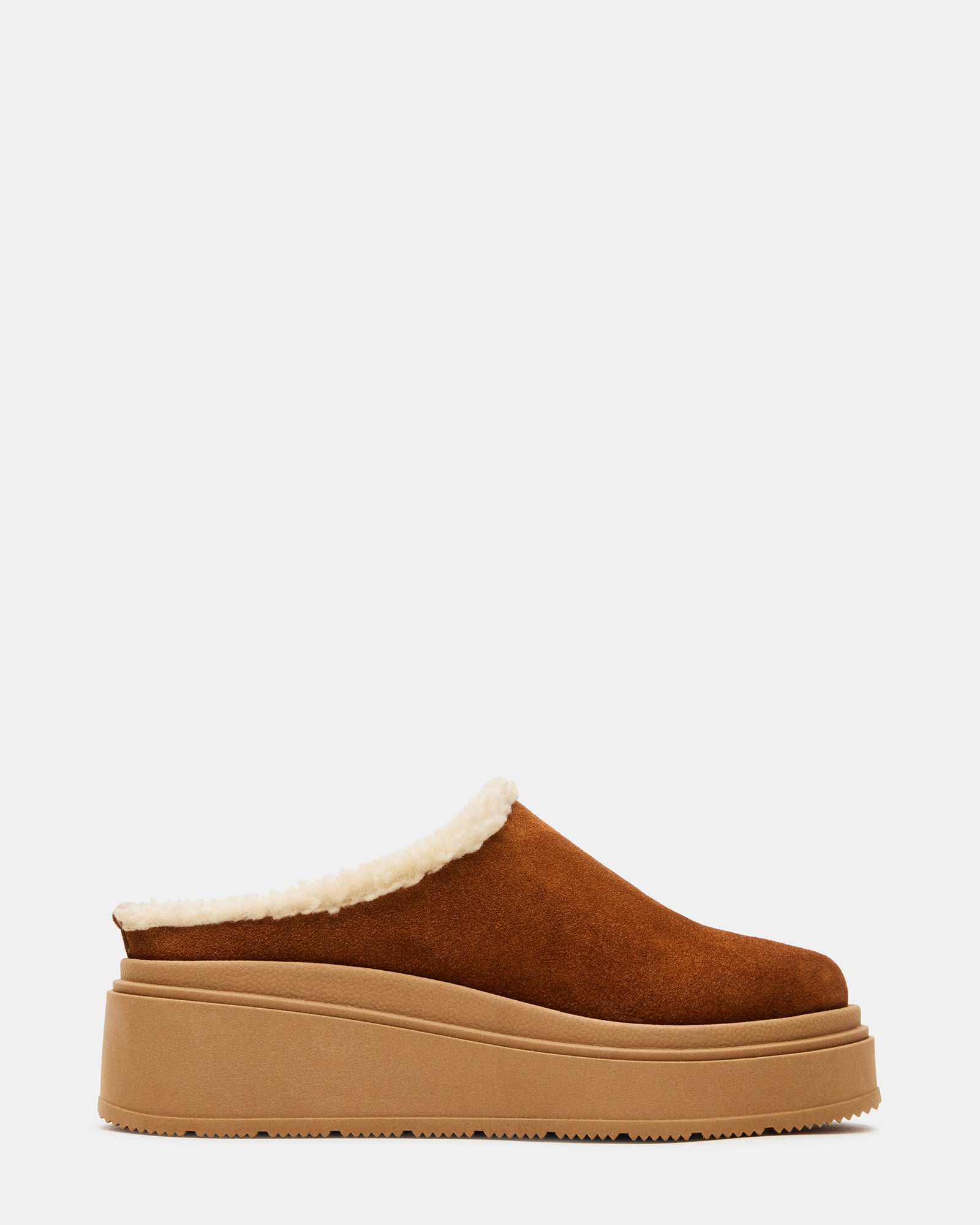 Smores tan suede platform sneakers from a side angle, showcasing the faux fur lining.