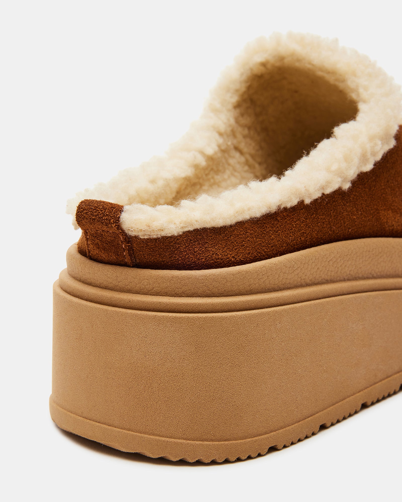 Stylish outfit pairing featuring these womens slip-on shoes with jeans and a sweater.