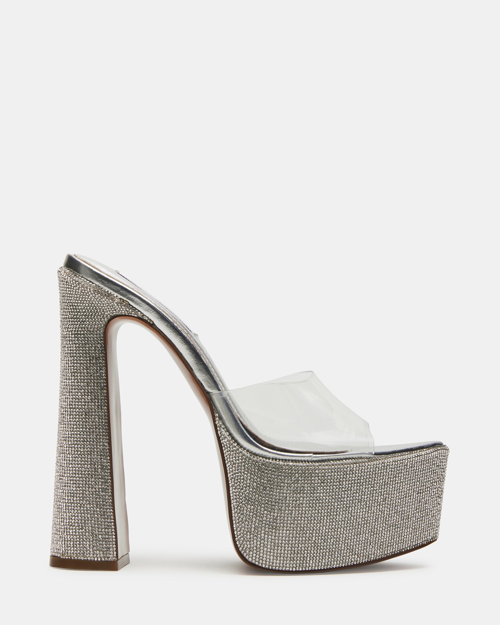 Close-up of the rhinestone mules showcasing the clear upper and block heel.