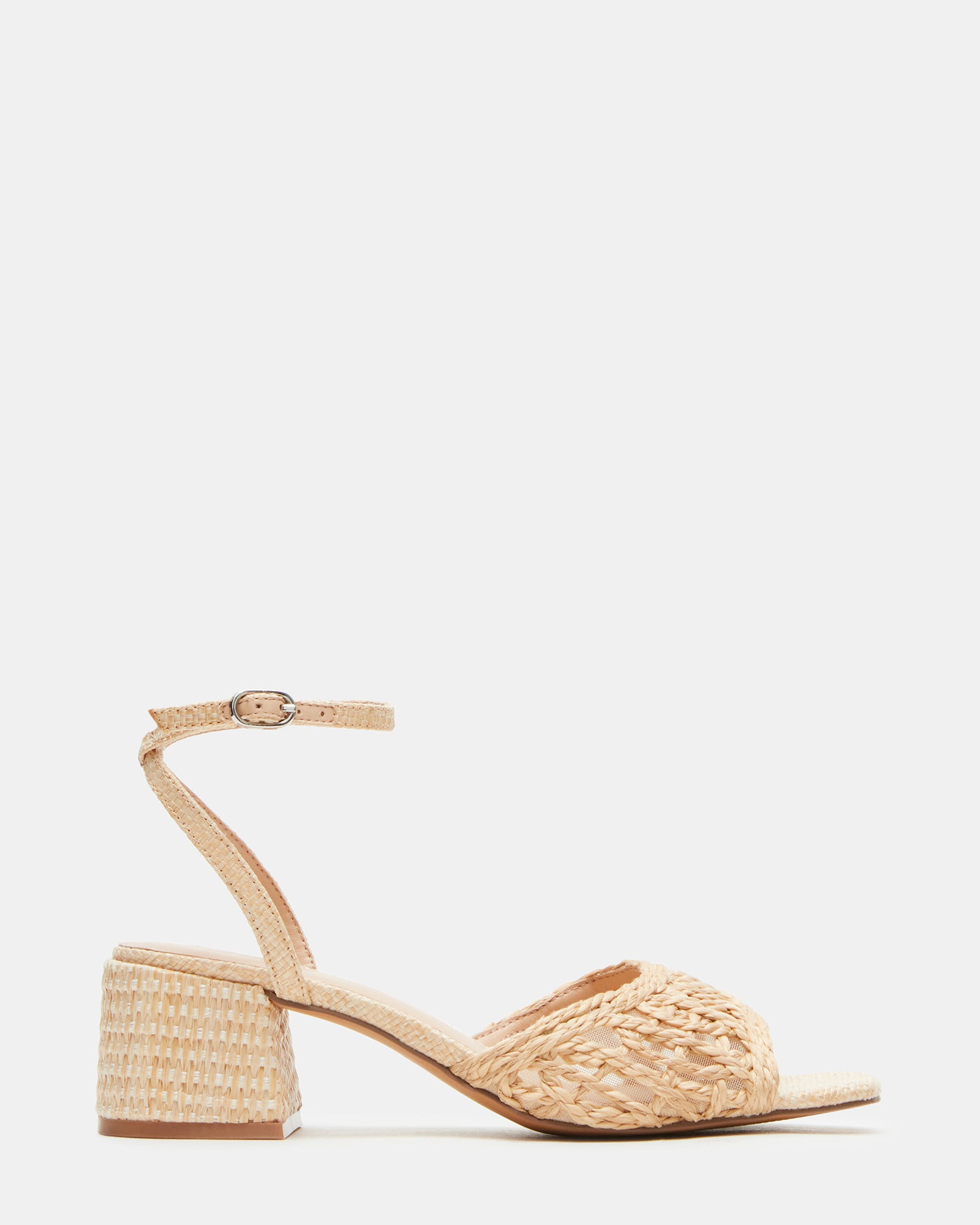 Side view of raffia platform sandals showing textured weave and ankle strap