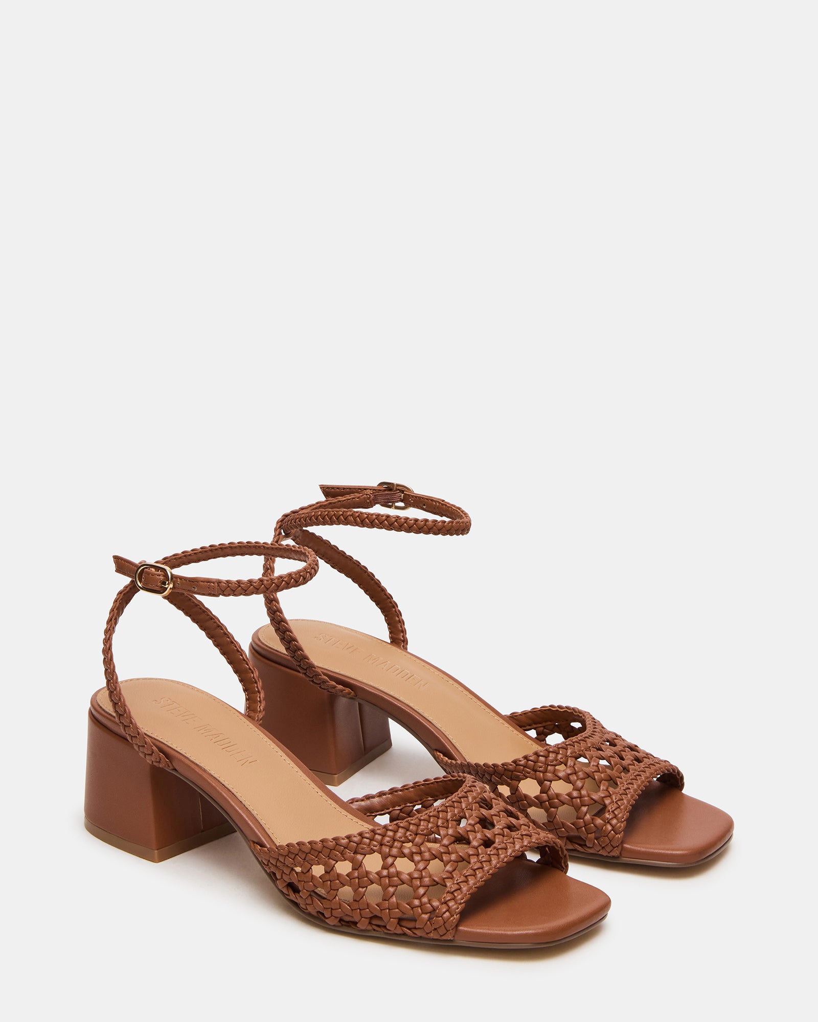 Close-up of the woven upper of the Soleil Tan sandals highlighting the texture.