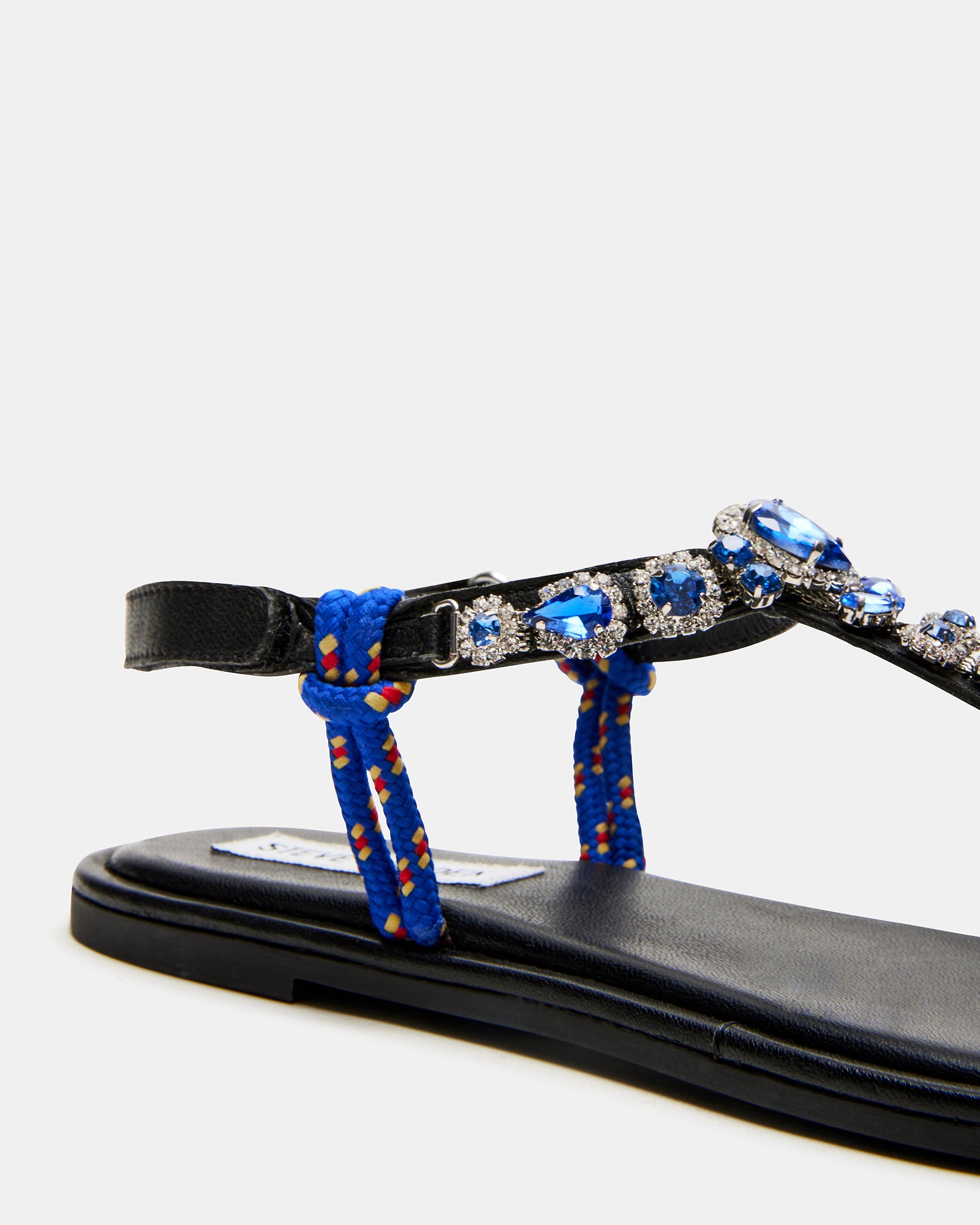 Fashionable women’s sandals paired with summer attire, highlighting the platform and heel height