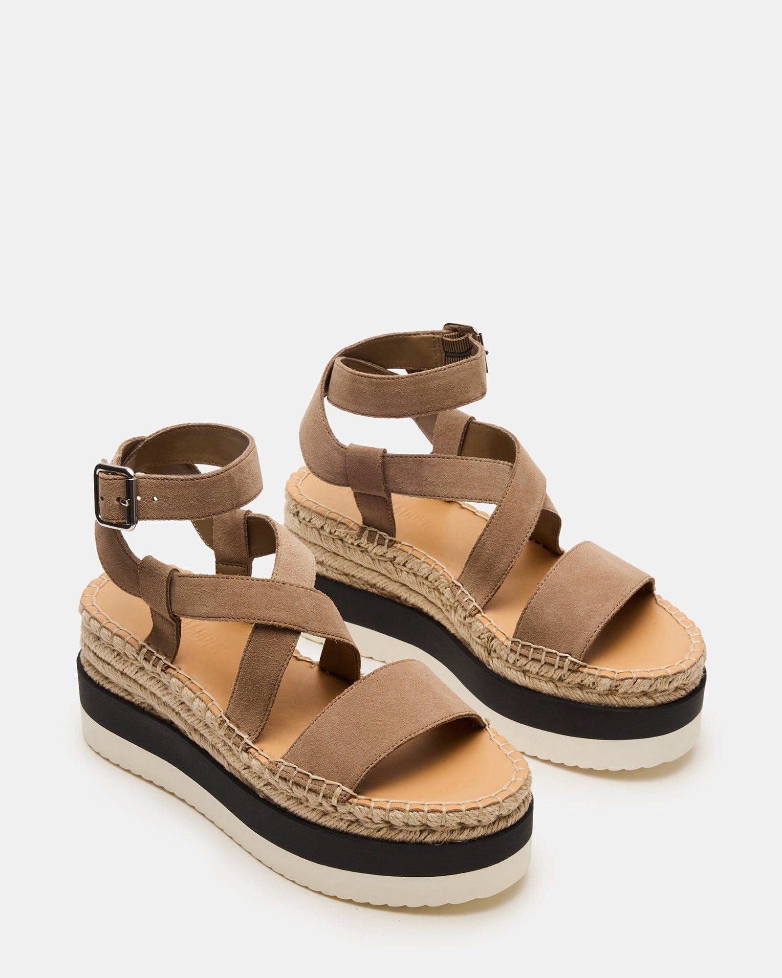 Close-up of the crisscross strappy design and ankle strap