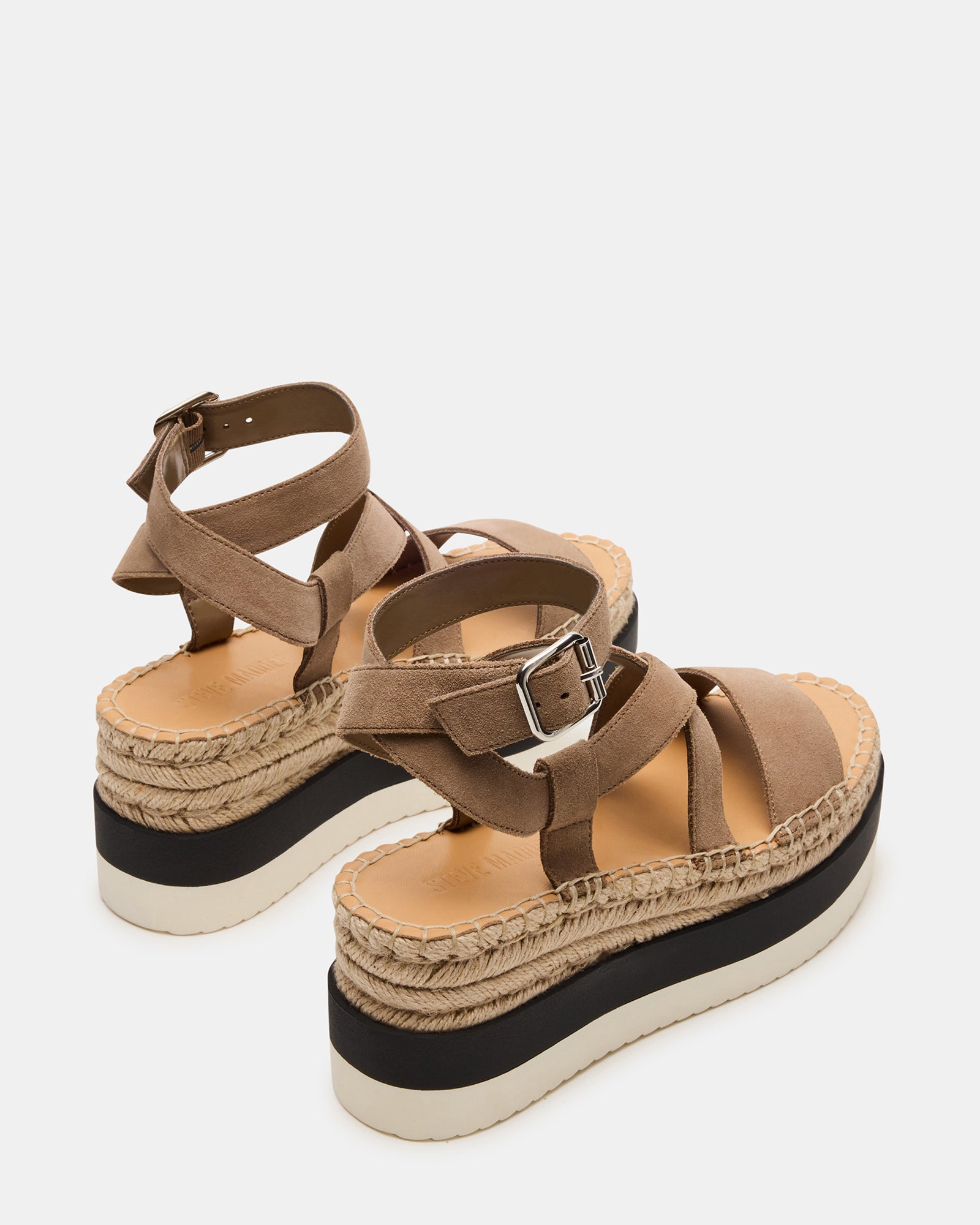 Close-up of the crisscross strappy design and ankle strap