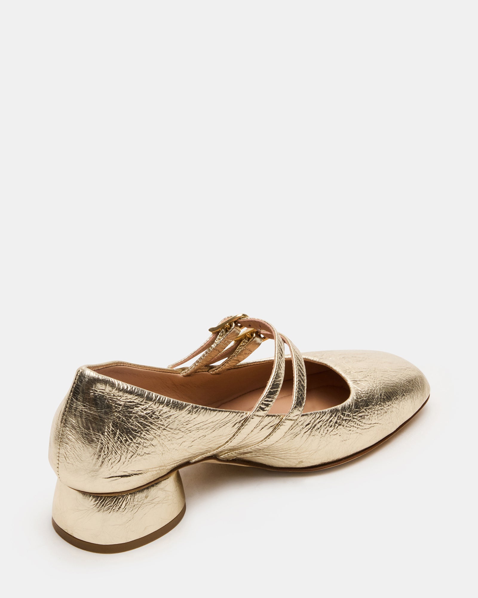 Close-up of square toe and buckle accent on black Mary Jane heels