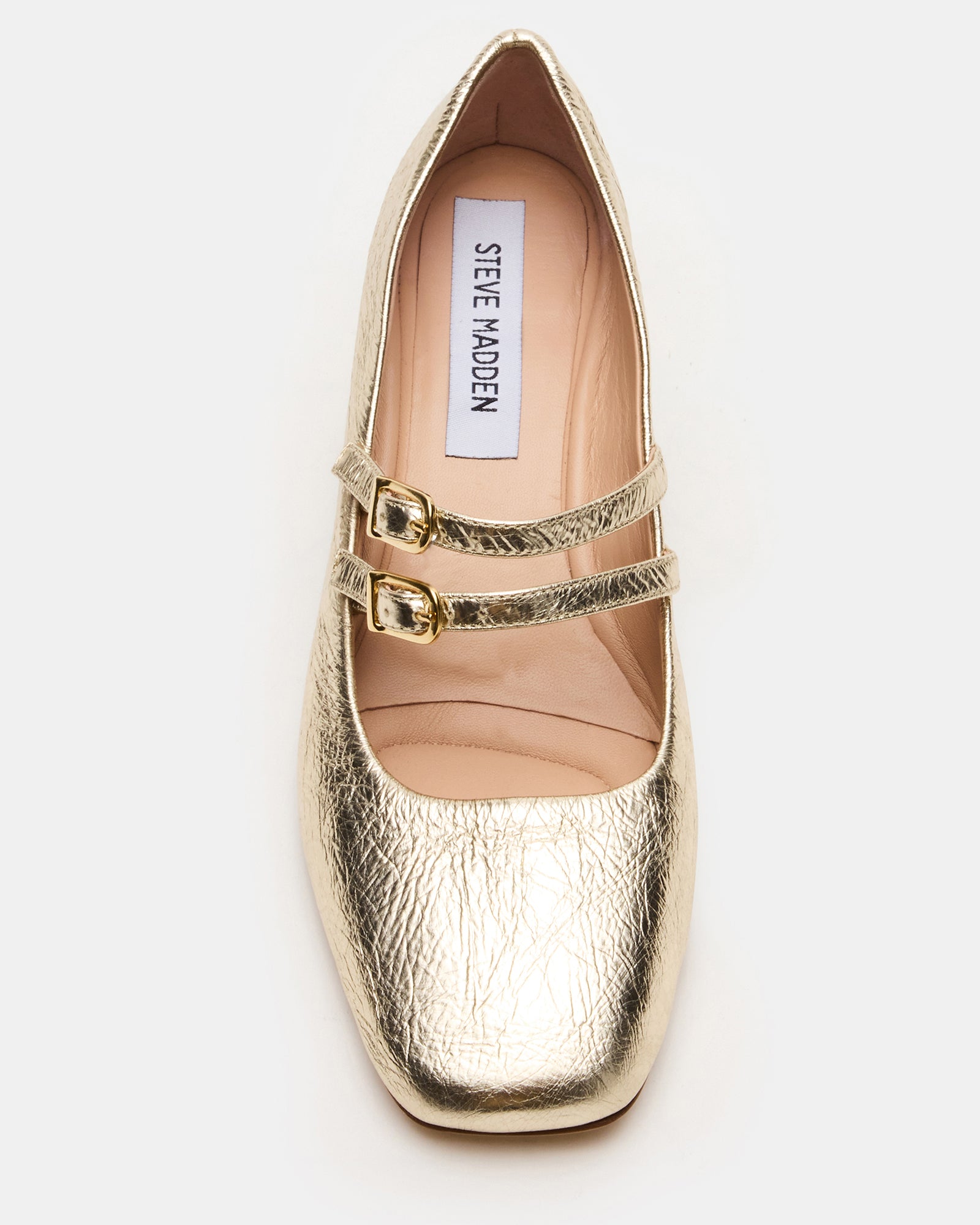 Side view of gold Mary Jane high heels showcasing leather texture and strap design