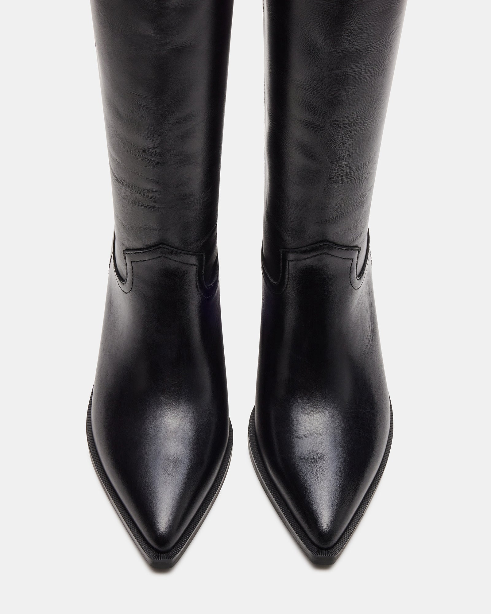 Close-up of the leather texture and stitching on the Stallion boots.