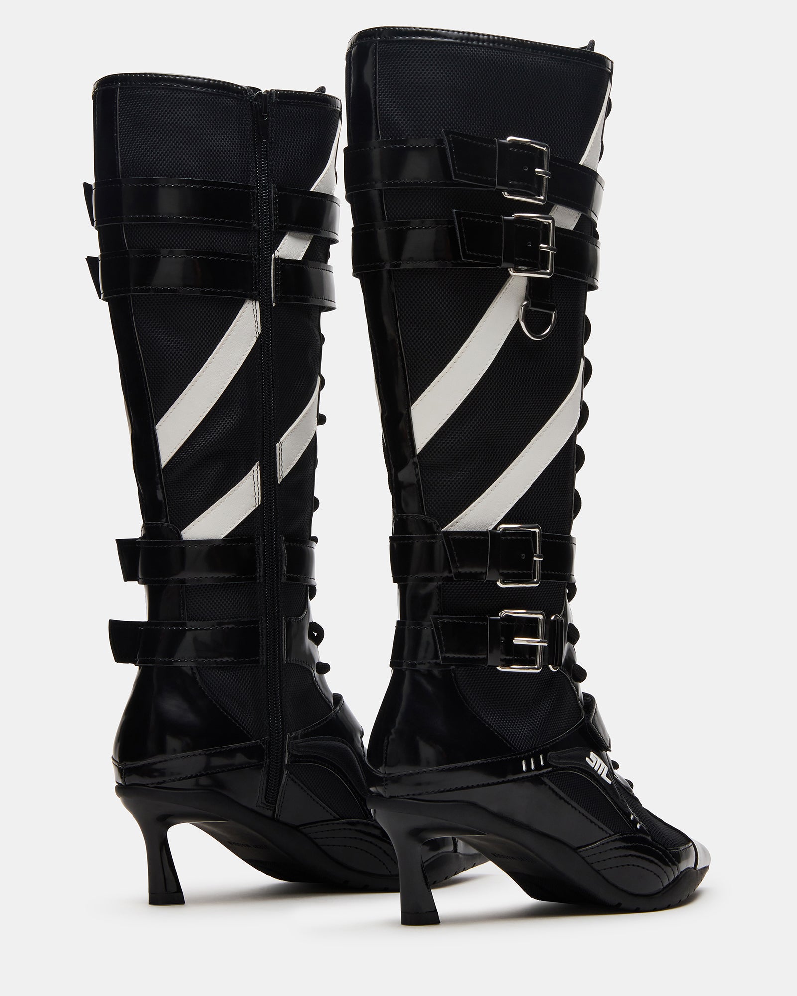 Side view of Stark black multi boots showcasing the 2-inch kitten heel and shaft details