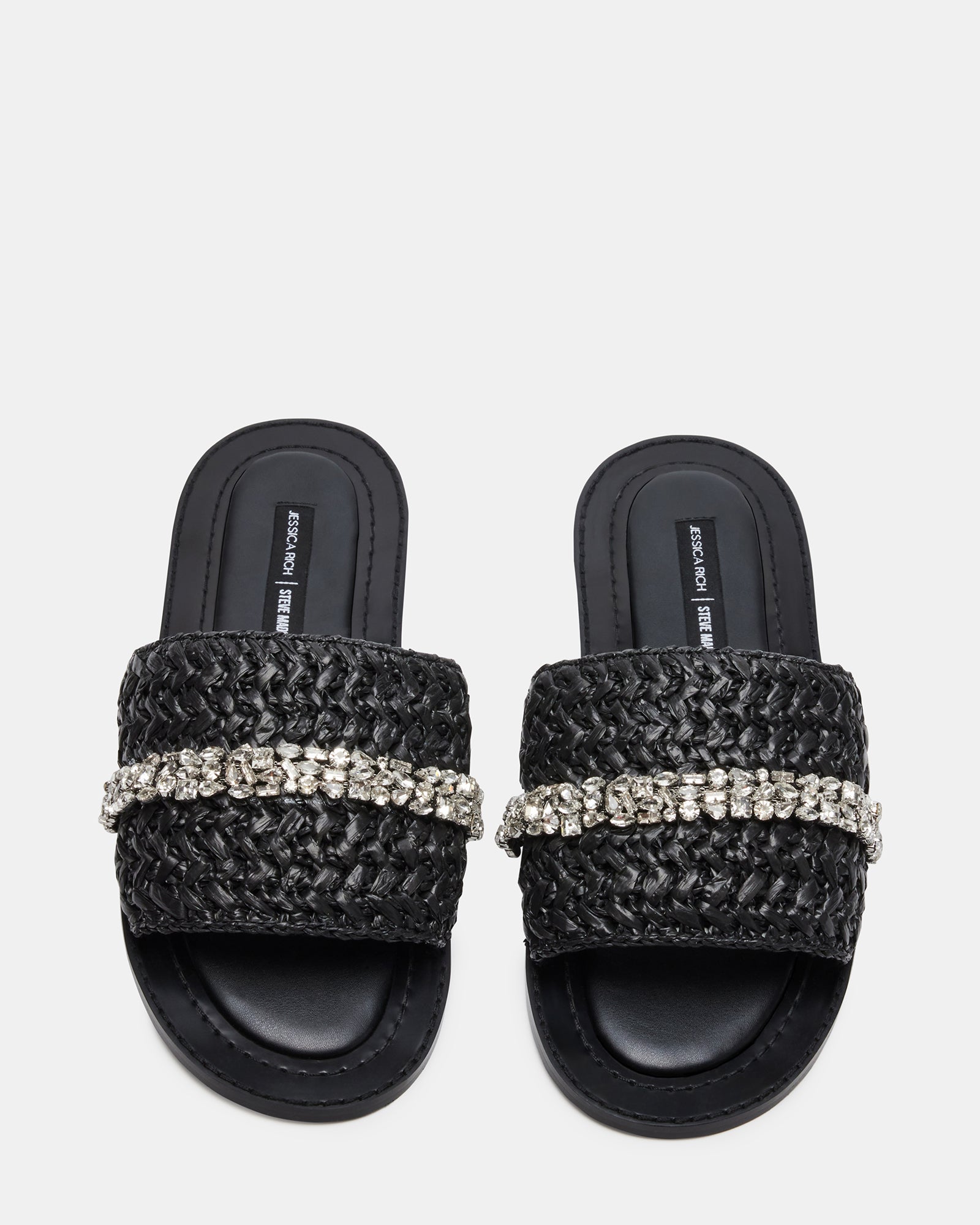 Black raffia slide sandals with embellished details, perfect for summer outings
