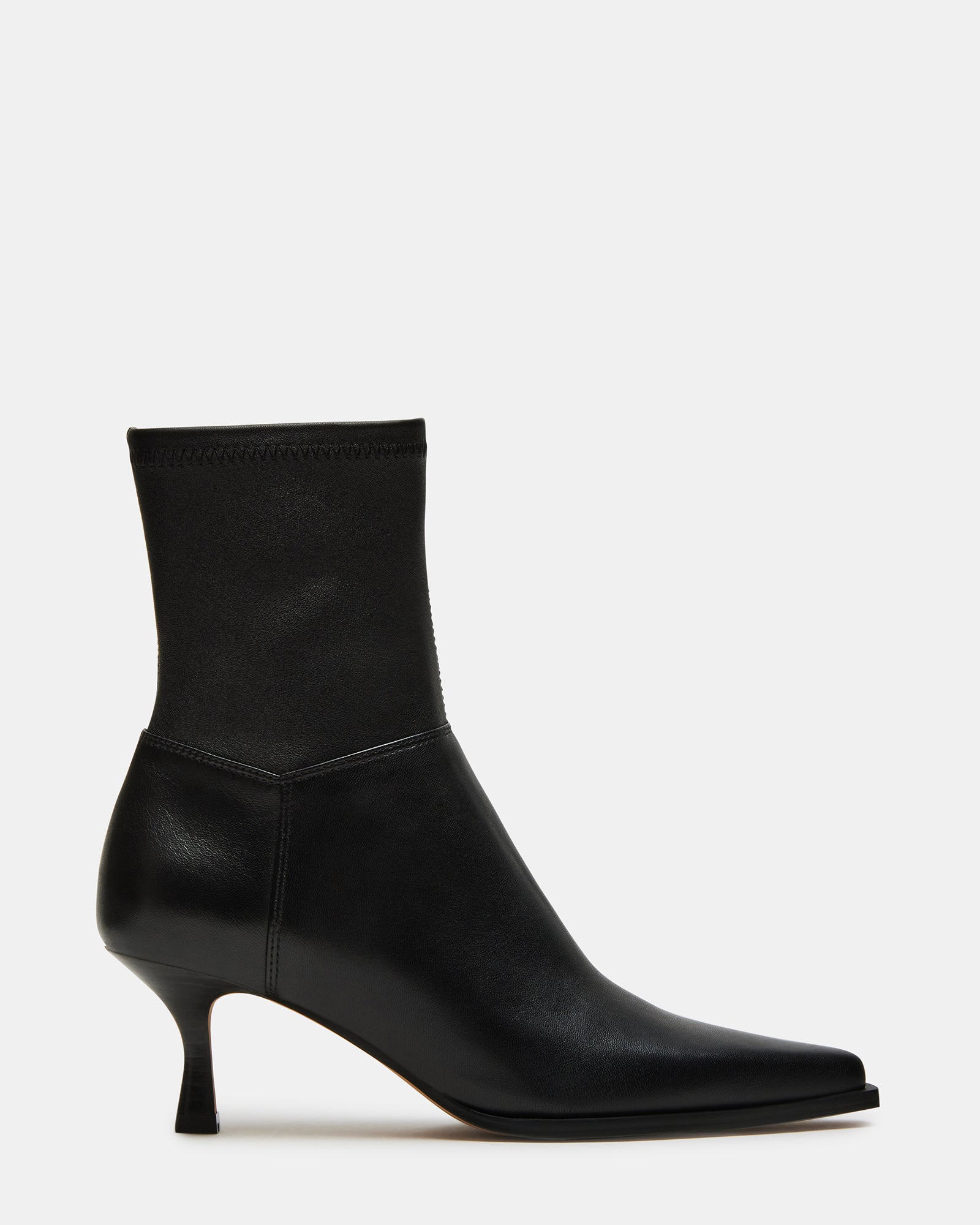 Side view of Stasia black leather ankle boots with pointed toe.