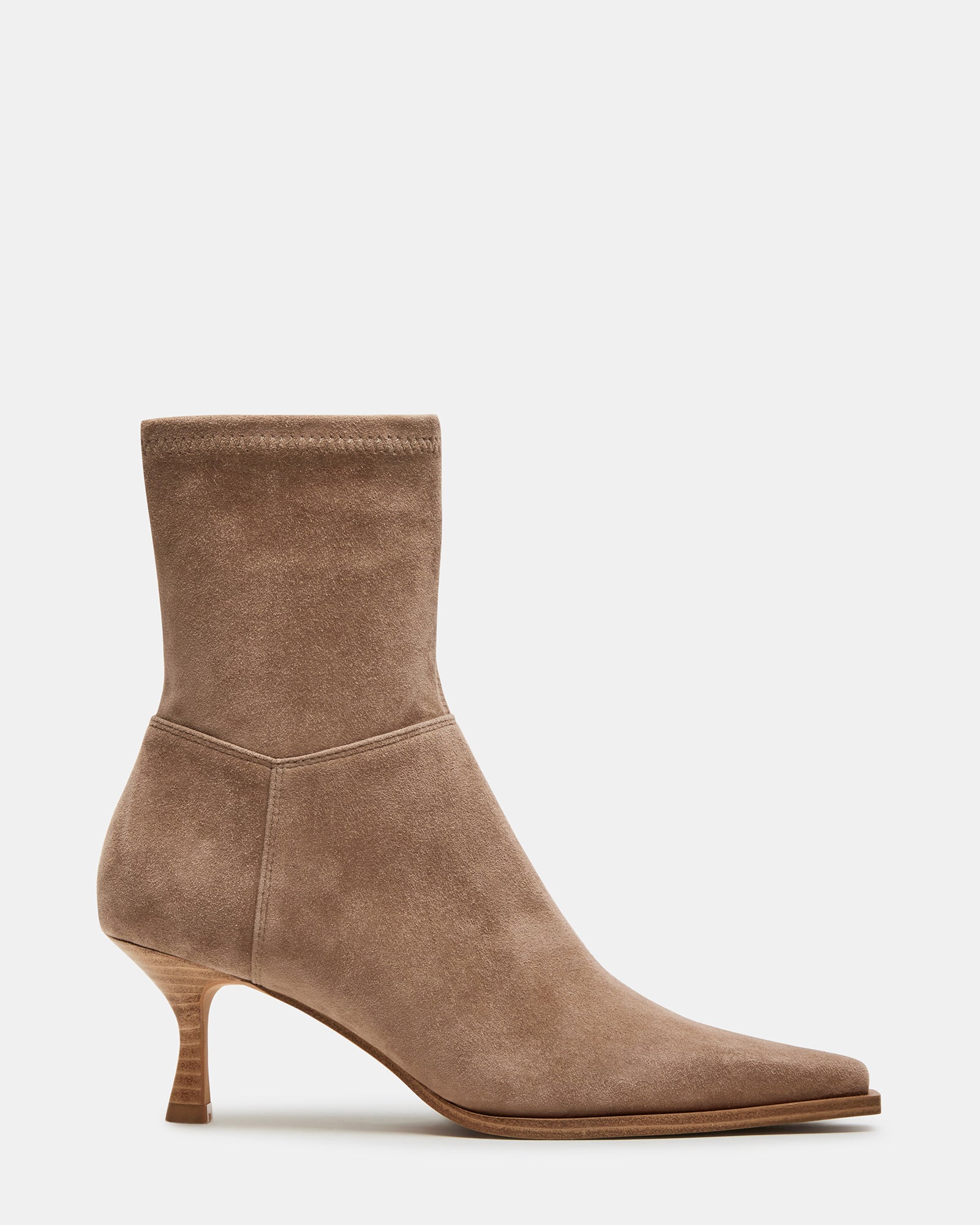 Close-up of brown suede booties showing pointed toe and 2.5-inch kitten heel.