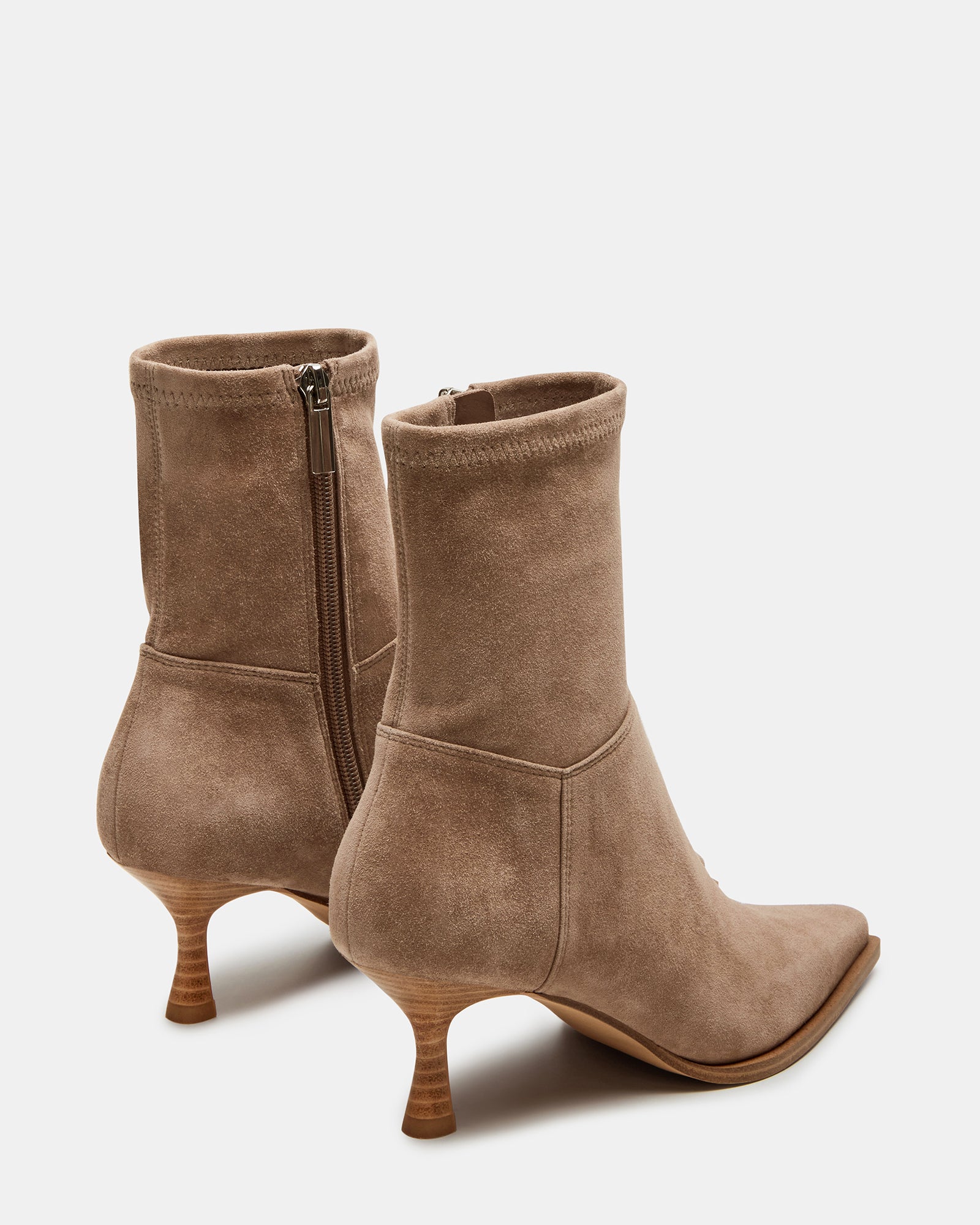 Top-down view of black suede bootie boots and taupe pair side-by-side for comparison.