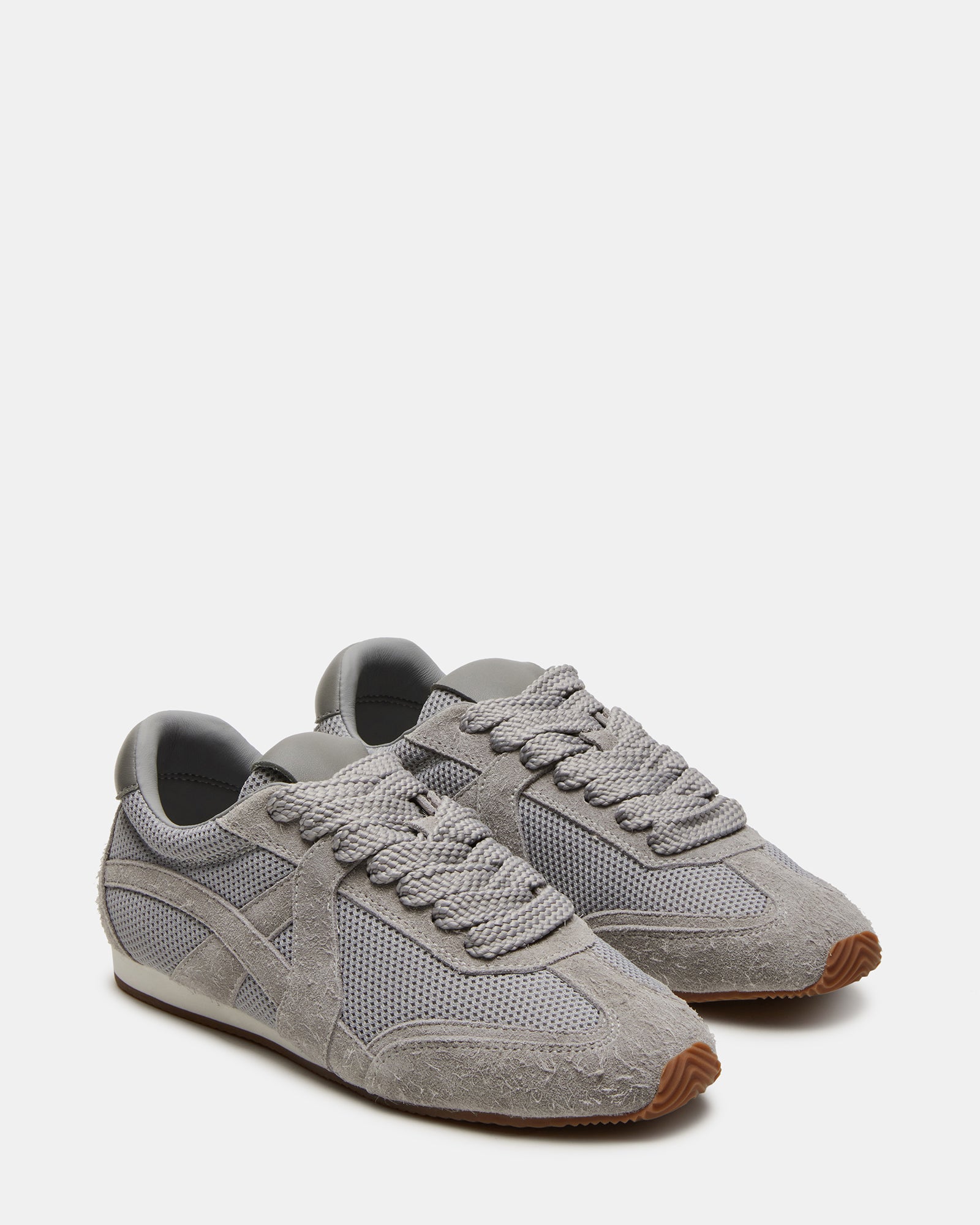 Stride Grey Suede sneakers styled for casual outdoor wear