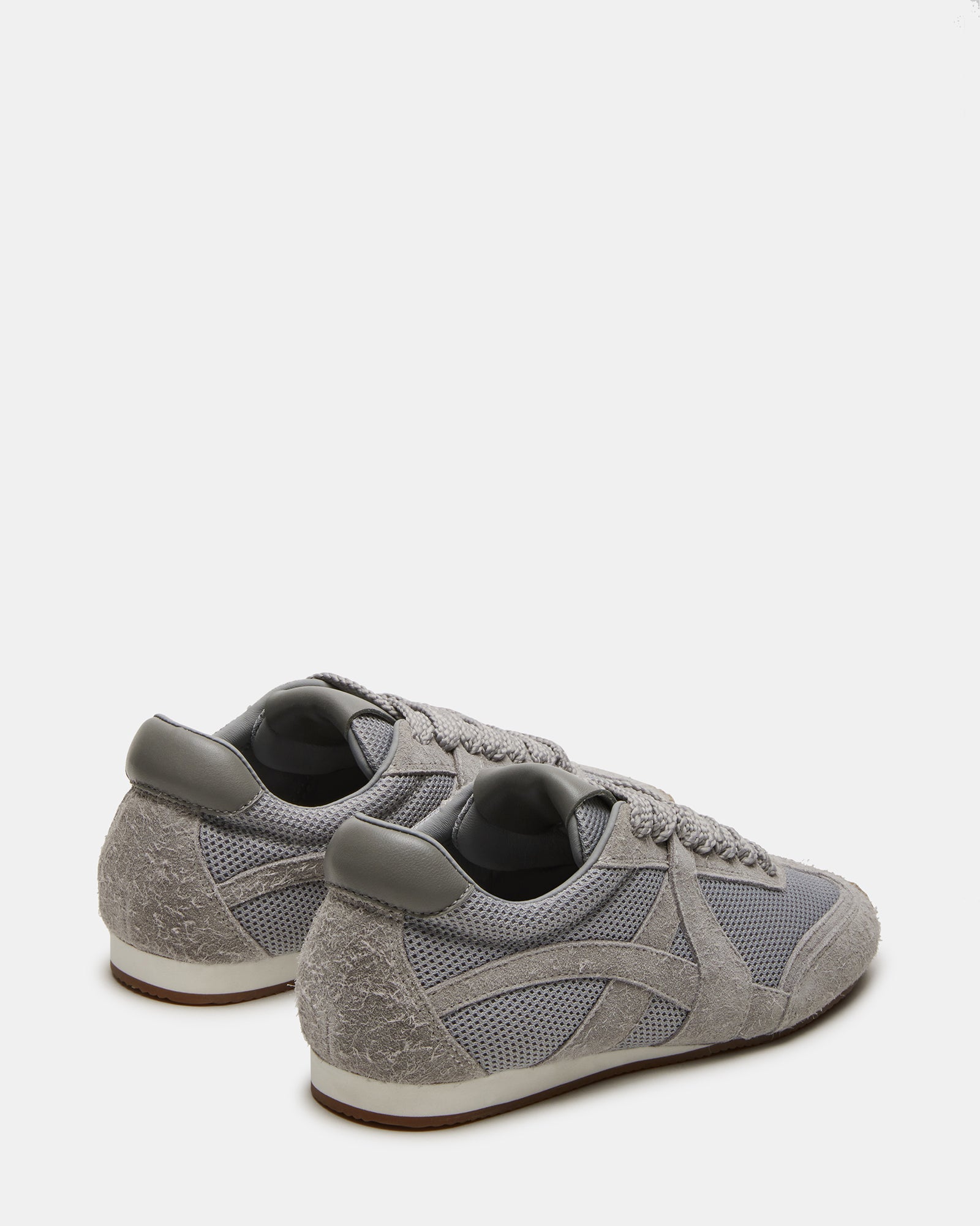 Stride Grey Suede sneakers styled for casual outdoor wear