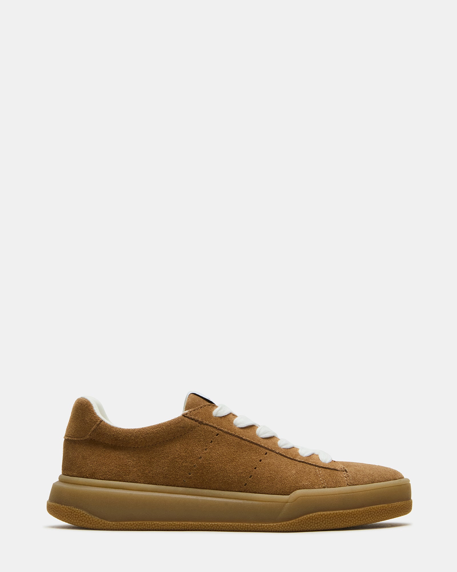 Strive tan suede shoes paired with rolled denim for a relaxed look
