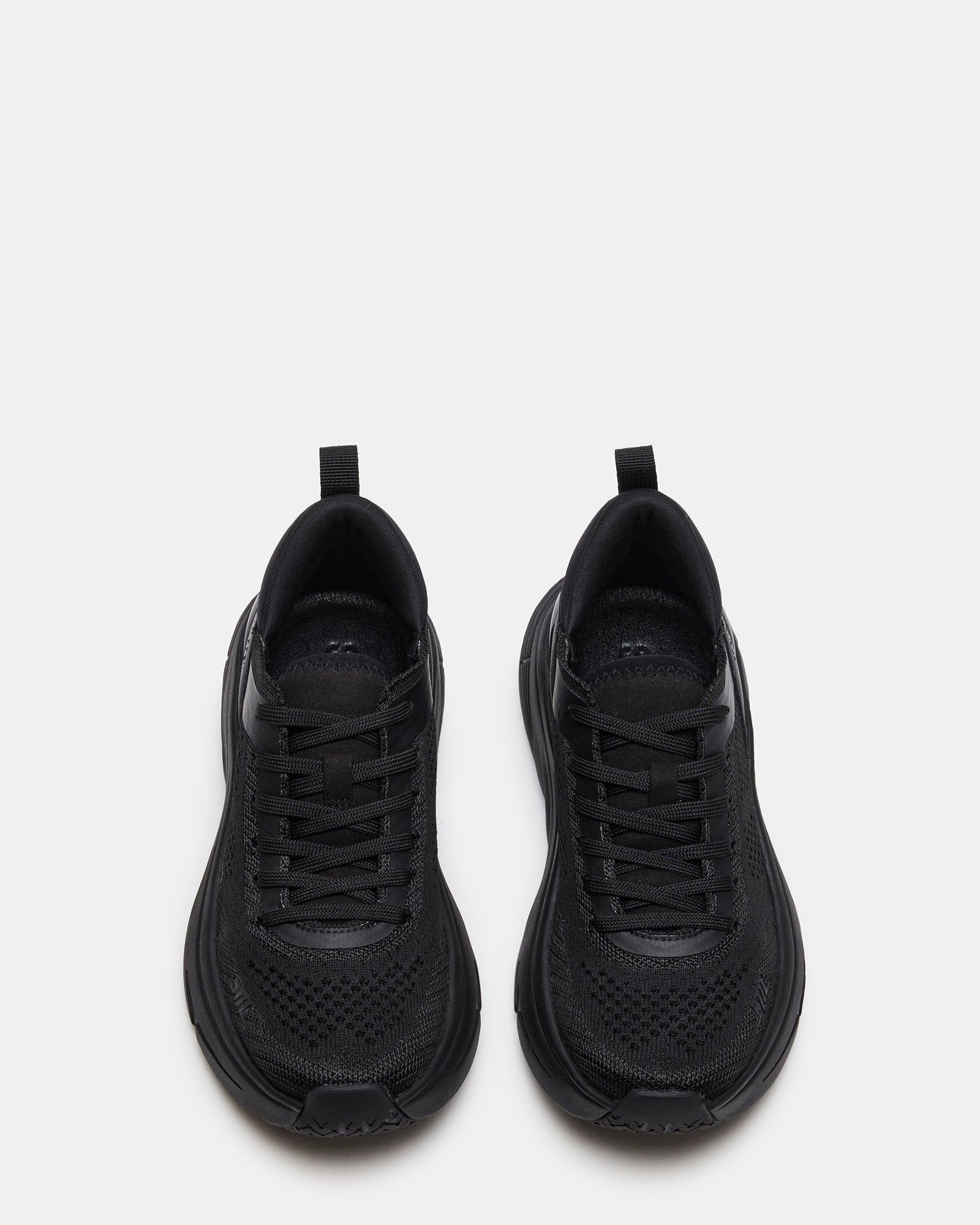Side view of the sneakers highlighting the 2-inch heel height