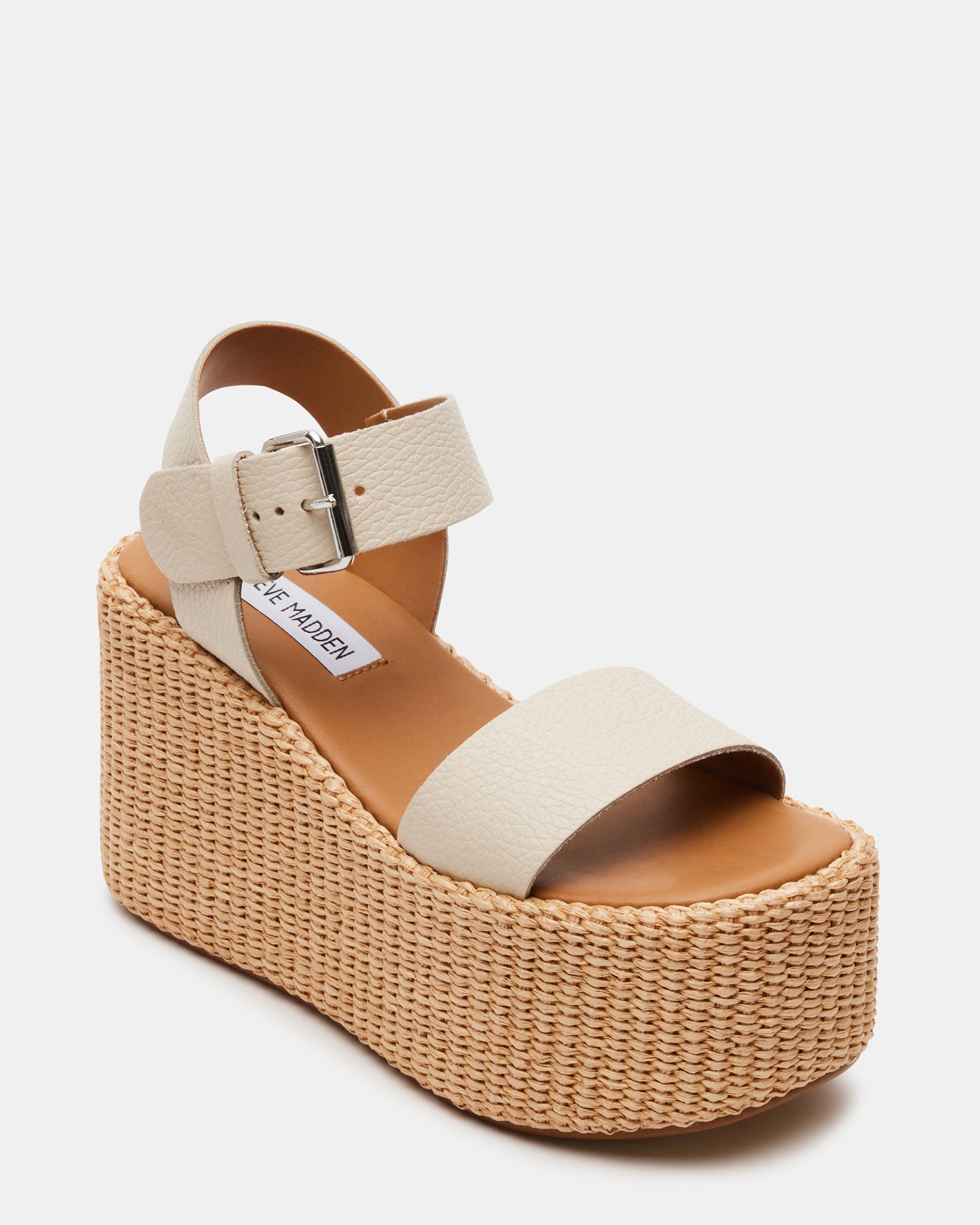 Front view of stylish wedge shoes for women with platform support
