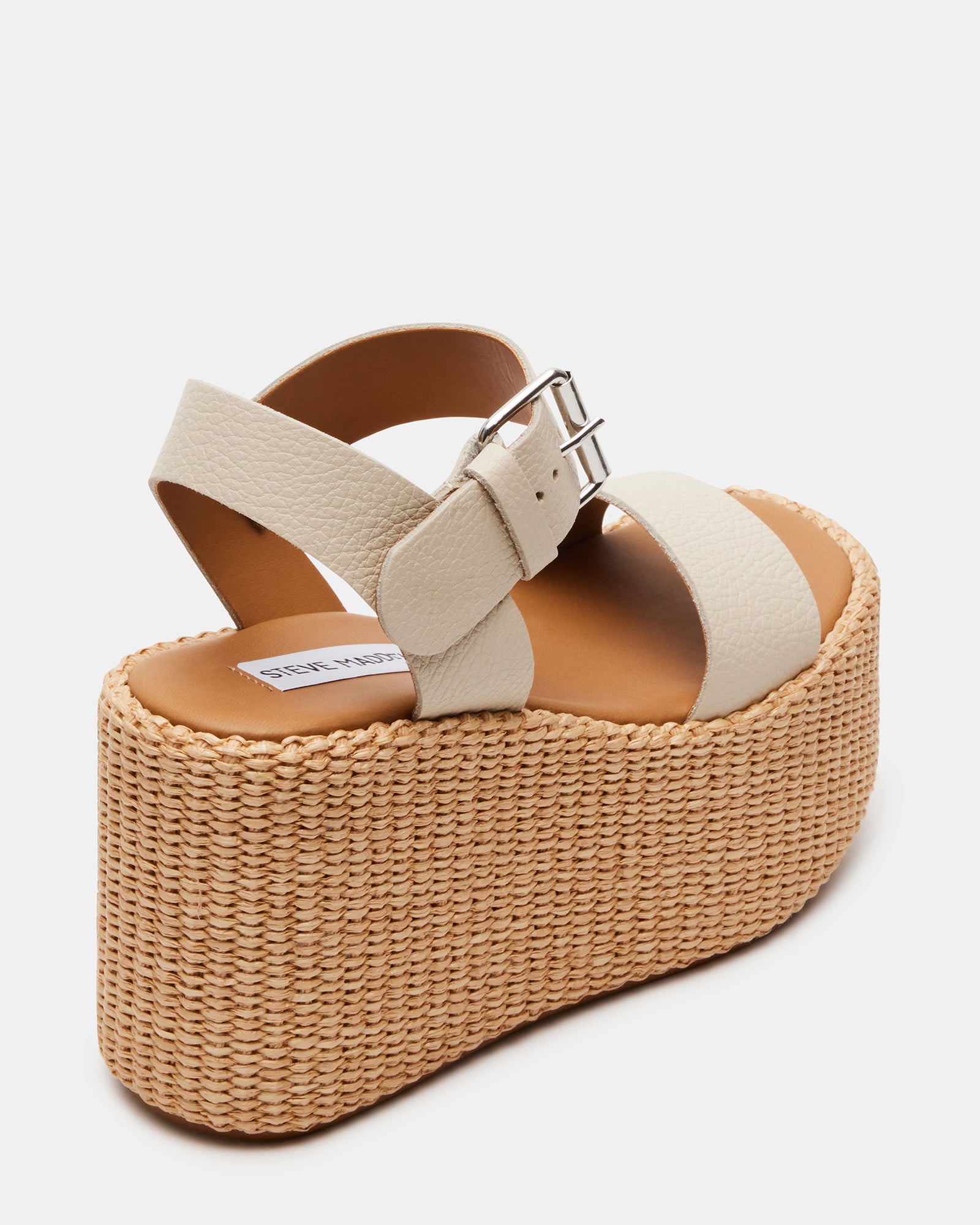 Front view of stylish wedge shoes for women with platform support