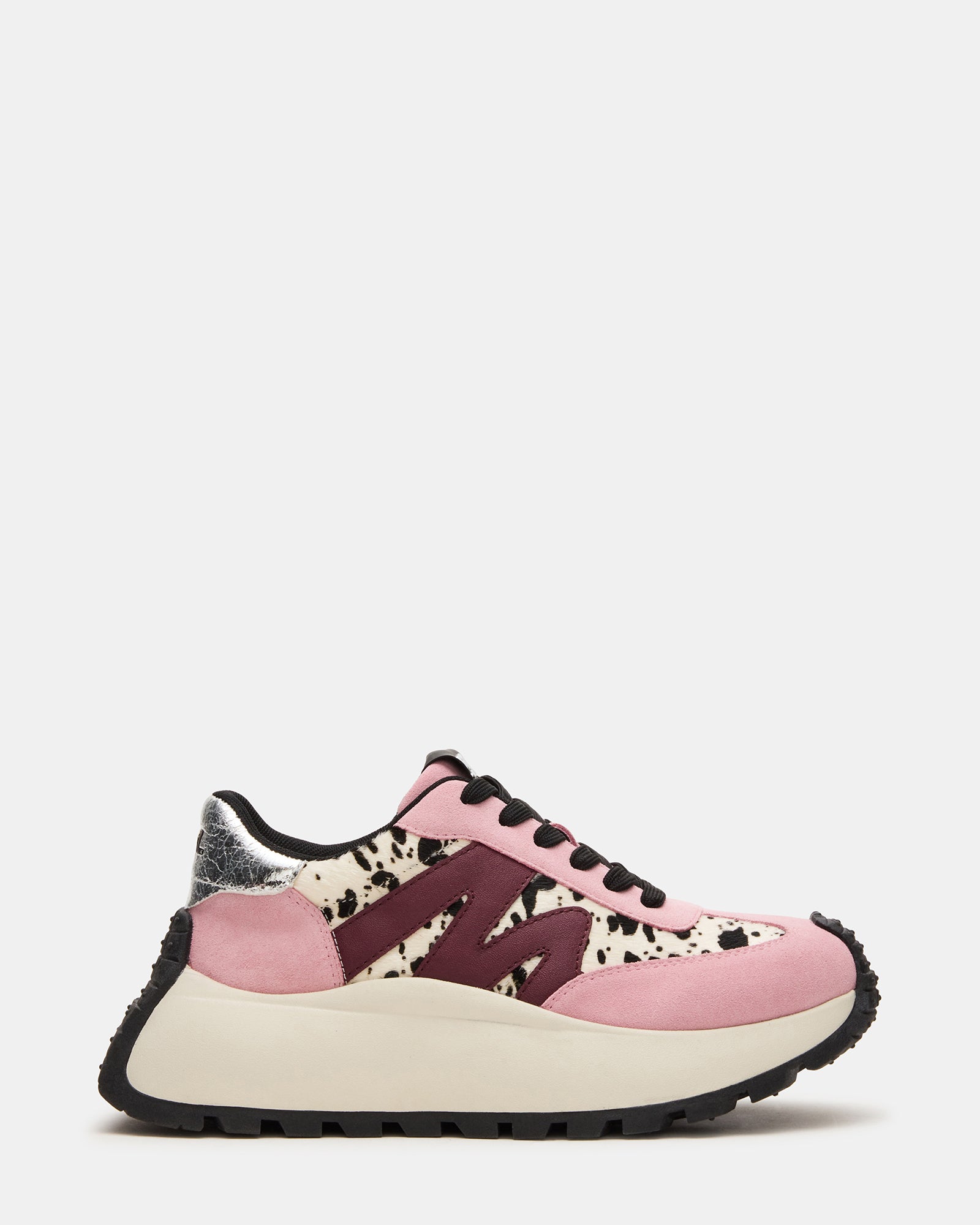 SUPERCAMPO platform sneakers shown with jeans for a casual look