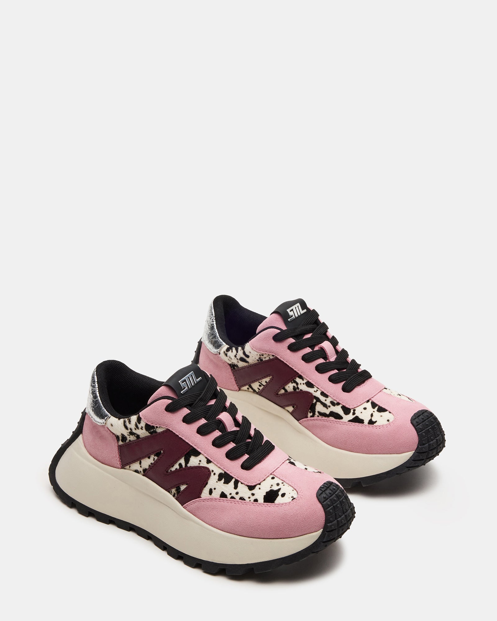 Close-up of the textured leather and suede upper on these Converse platform sneakers