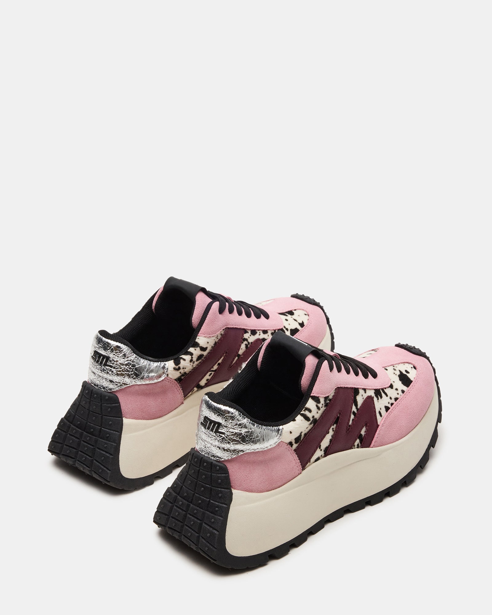 Close-up of the textured leather and suede upper on these Converse platform sneakers