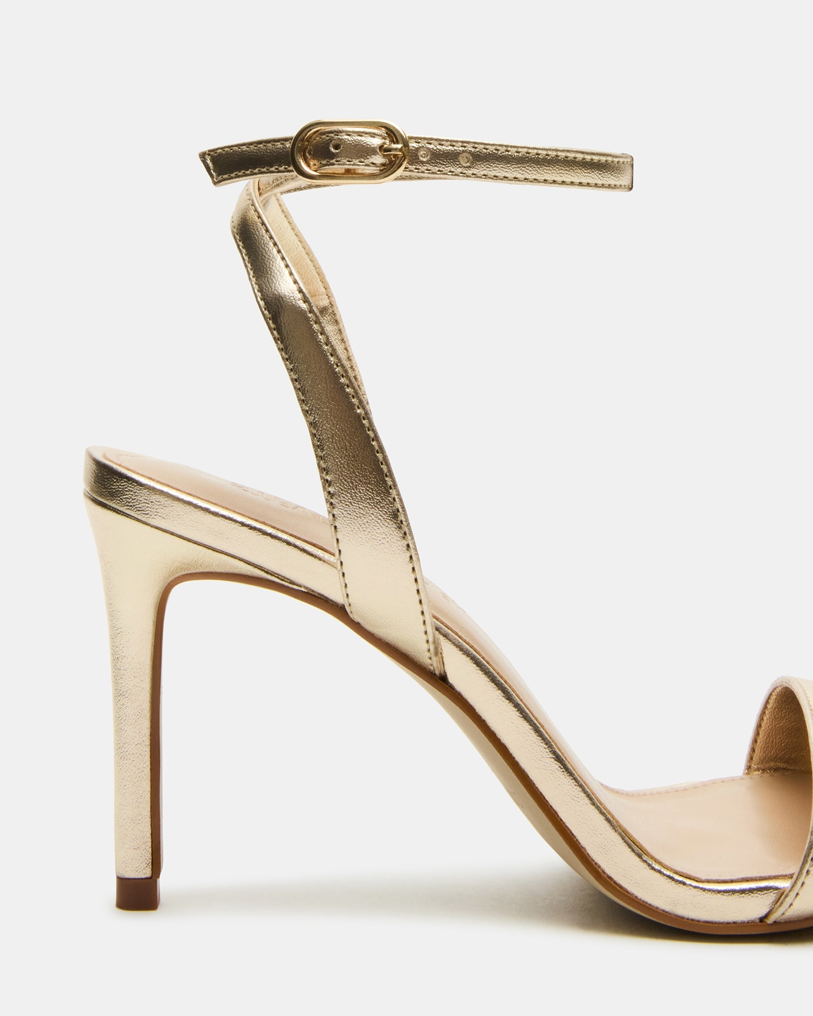 Front profile of black ankle strap heels with rounded toe and high heel for formal occasions