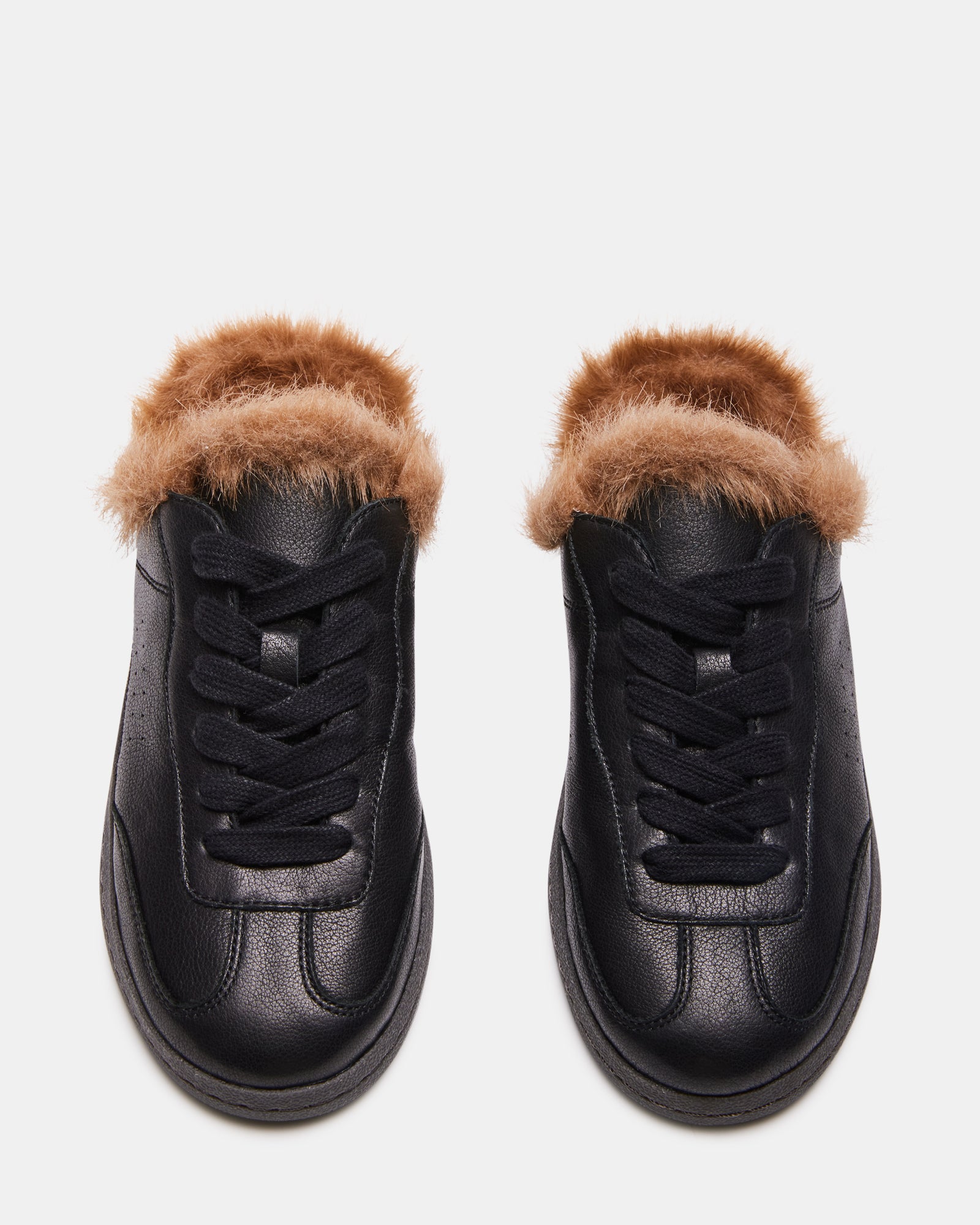 Close-up of stylish black leather sneakers featuring faux fur lining.