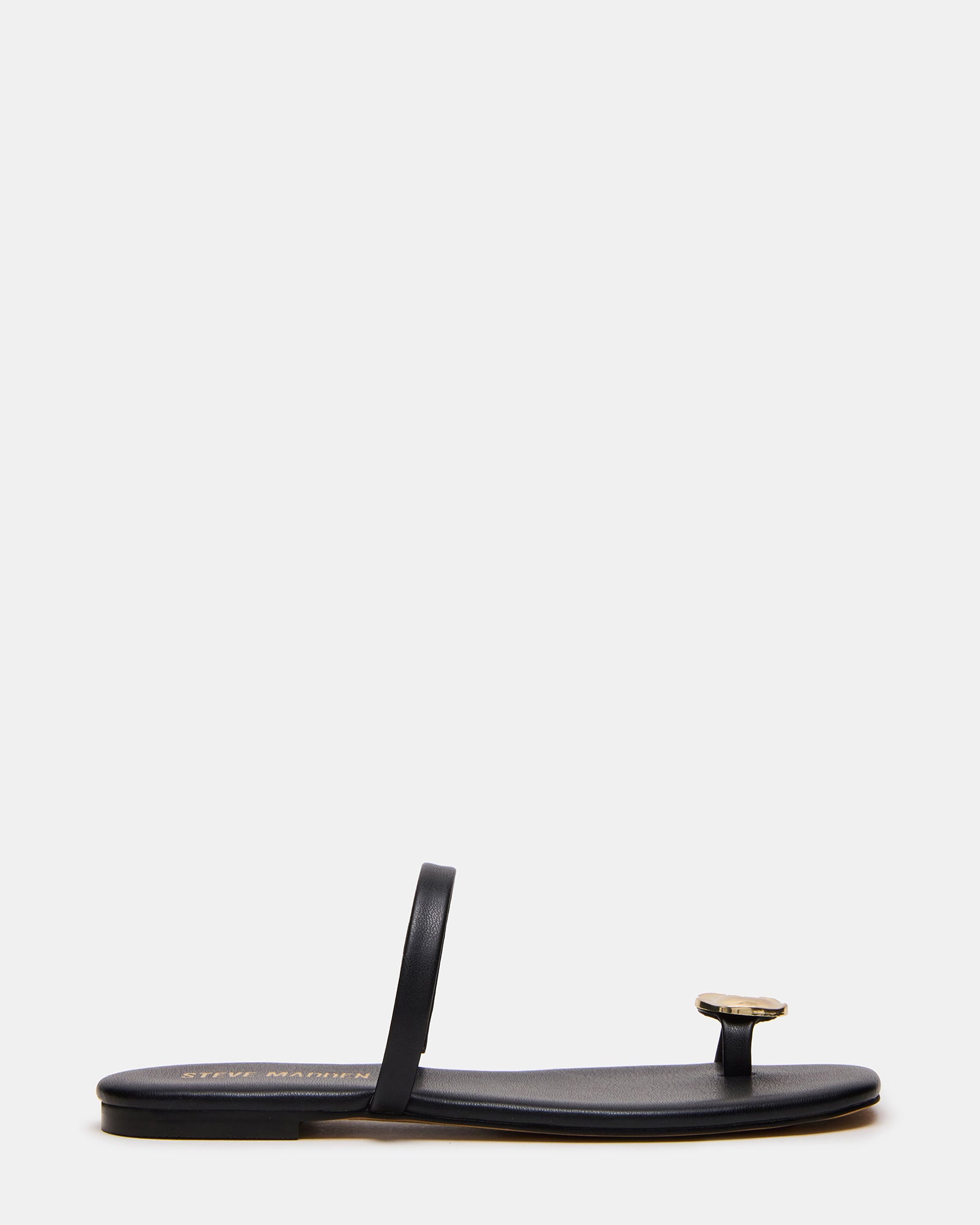 Side view of black flat sandals showcasing their sleek design.